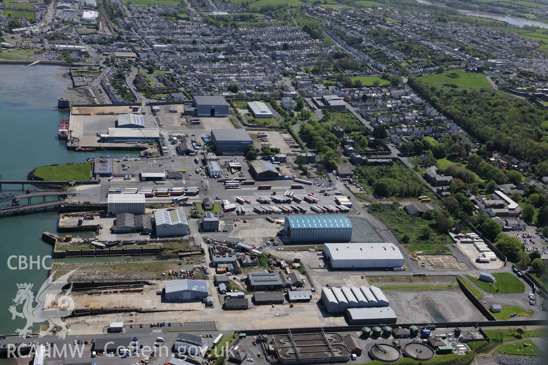 Pembroke Royal Dockyard and the dry dock at Pembroke Dockyard, Pembroke Dock. Oblique aerial photograph taken during the Royal Commission's programme of archaeological aerial reconnaissance by Toby Driver on 13th May 2015.