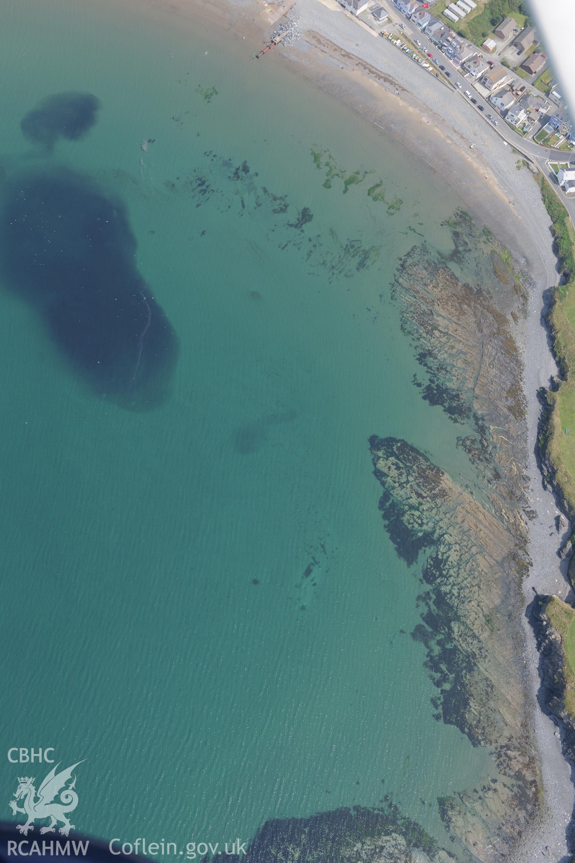 Borth village. Oblique aerial photograph taken during the Royal Commission?s programme of archaeological aerial reconnaissance by Toby Driver on 12th July 2013.