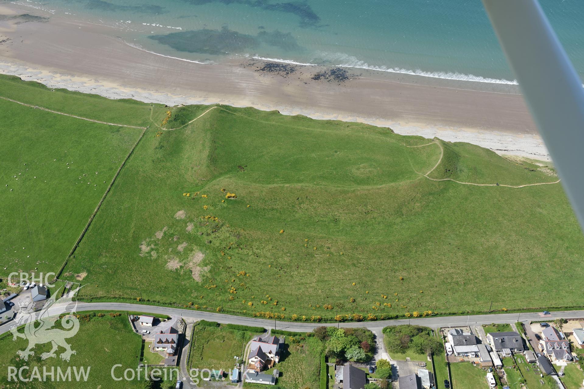 Aerial photography of Dinas Dinlle taken on 3rd May 2017.  Baseline aerial reconnaissance survey for the CHERISH Project. ? Crown: CHERISH PROJECT 2017. Produced with EU funds through the Ireland Wales Co-operation Programme 2014-2020. All material made