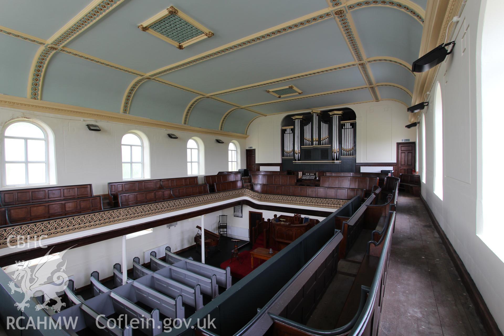 Colour photograph showing interior view looking from first floor balcony towards organ at Mynydd-Bach Independent Chapel, Treboeth, Swansea. Taken during photographic survey conducted by Sue Fielding on 13th May 2017.