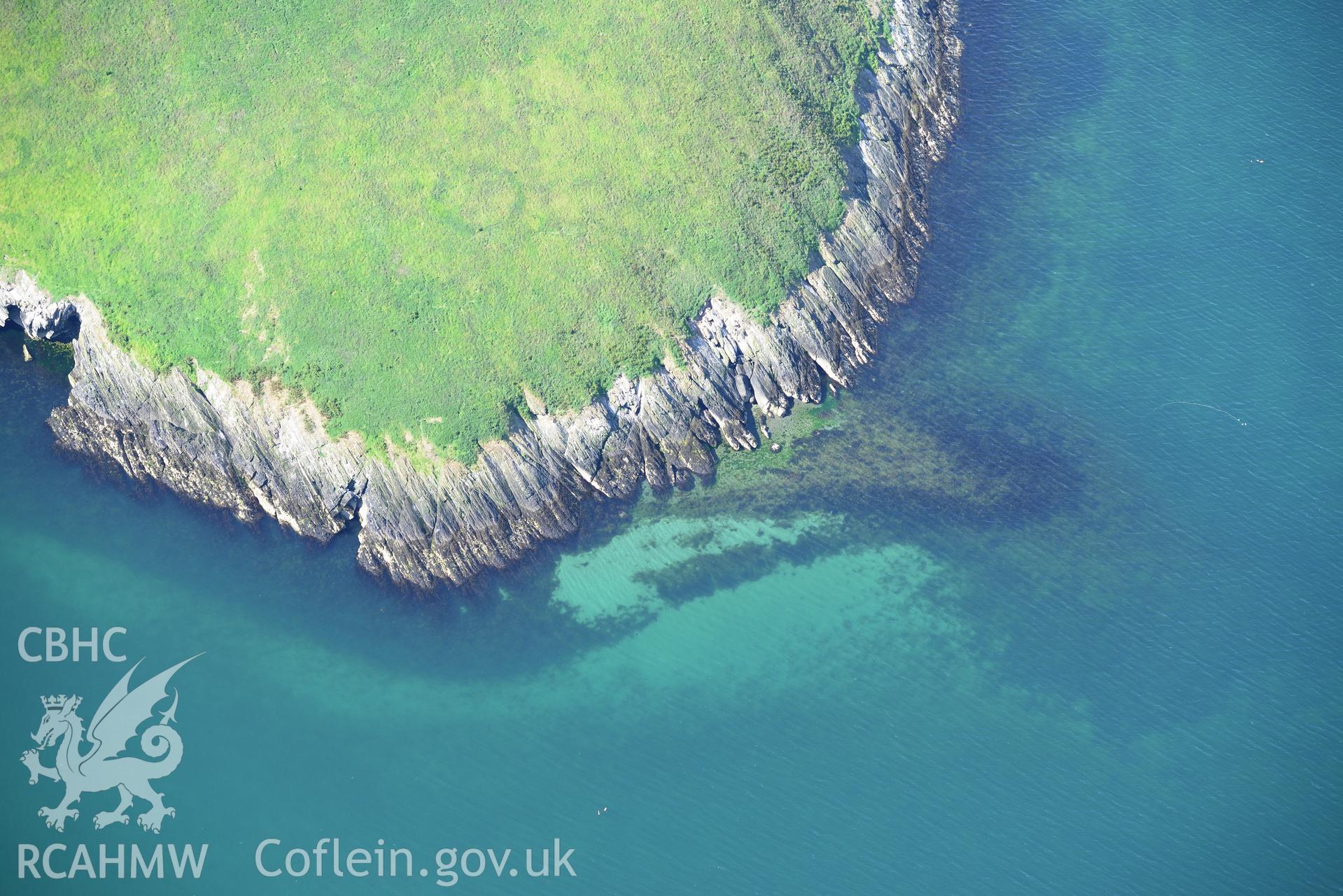 Fish trap at St Tudwal's Island (east). Oblique aerial photograph taken during the Royal Commission's programme of archaeological aerial reconnaissance by Toby Driver on 23rd June 2015.