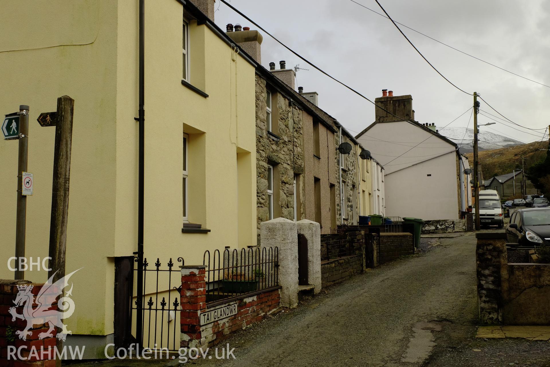 Colour photograph showing view looking east at Tai Glandwr, Min Afon (north side), Clwt-y-bont, Deiniolen, produced by Richard Hayman 7th March 2017