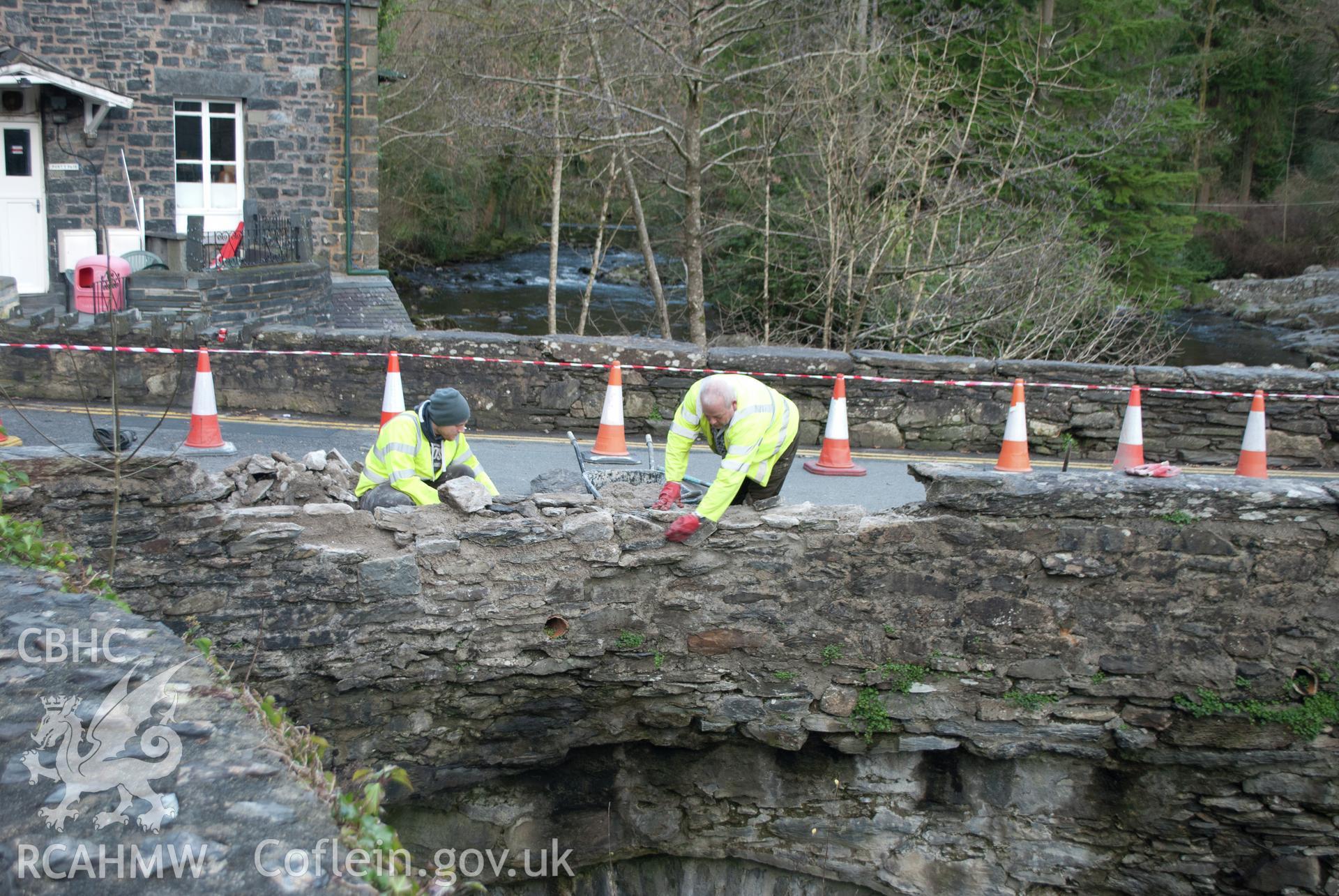 General view of the rebuilding work from the east-southeast (riverside) of the bridge. Digital photograph taken for Archaeological Watching Brief at Pont y Pair, Betws y Coed, 2019. Gwynedd Archaeological Trust Project no. G2587.