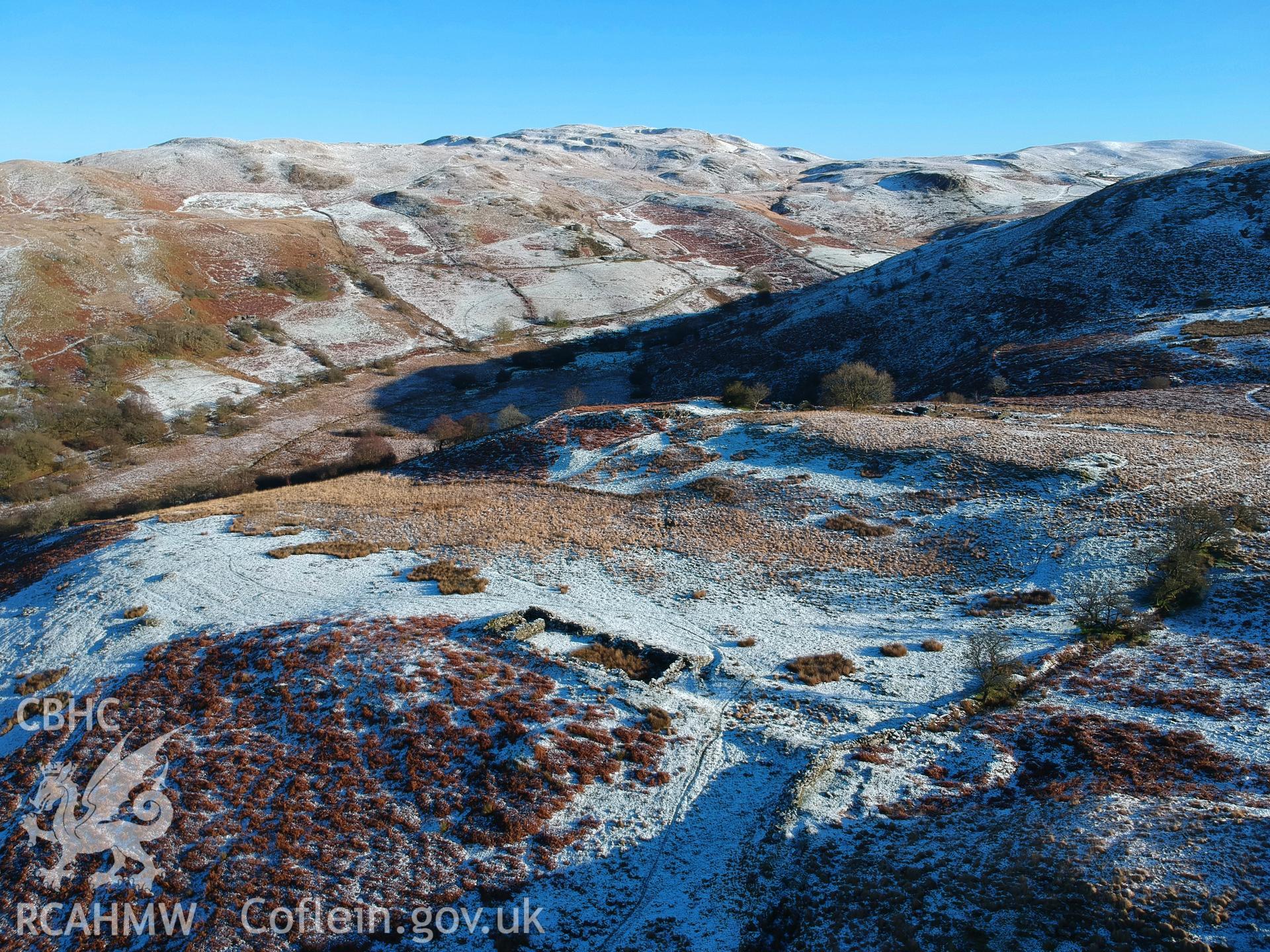 Aerial view showing remains of deserted, dry-stone walled Hafod Eidos rural settlement, Cwm Mwyro. Colour photograph taken by Paul R. Davis on 17th January 2019.