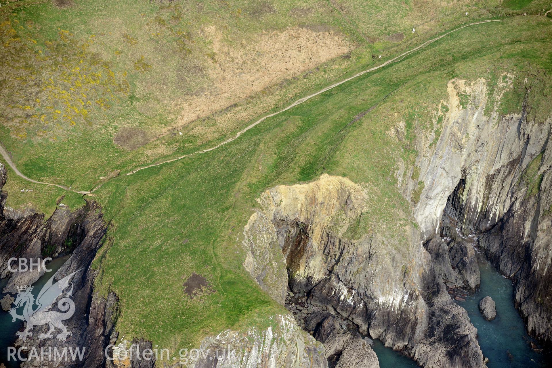 Aerial photography of Porth y Rhaw promontory fort taken on 27th March 2017 for structure from motion recording. Baseline aerial reconnaissance survey for the CHERISH Project. ? Crown: CHERISH PROJECT 2019. Produced with EU funds through the Ireland Wales Co-operation Programme 2014-2020. All material made freely available through the Open Government Licence.