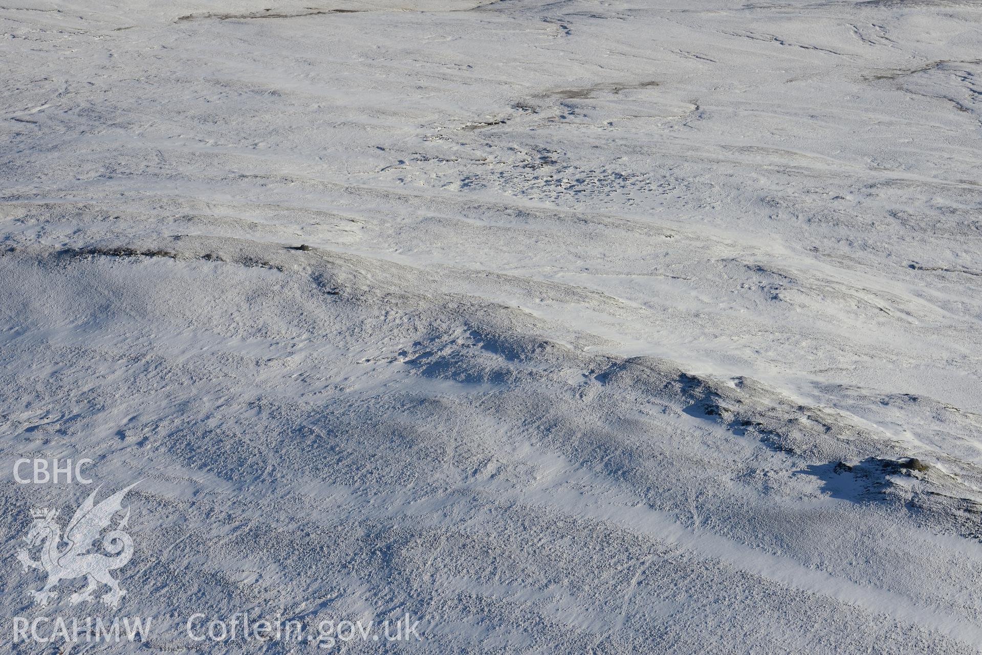 Drygarn Fawr cairn, north west of Builth Wells. Oblique aerial photograph taken during the Royal Commission's programme of archaeological aerial reconnaissance by Toby Driver on 4th February 2015.