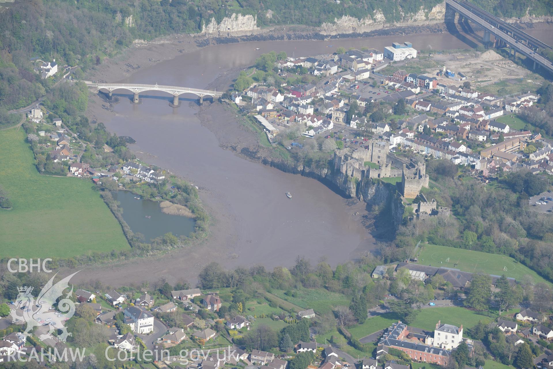 Chepstow including views of the Castle, Old Bridge and The Mount House. Oblique aerial photograph taken during the Royal Commission's programme of archaeological aerial reconnaissance by Toby Driver on 21st April 2015.
