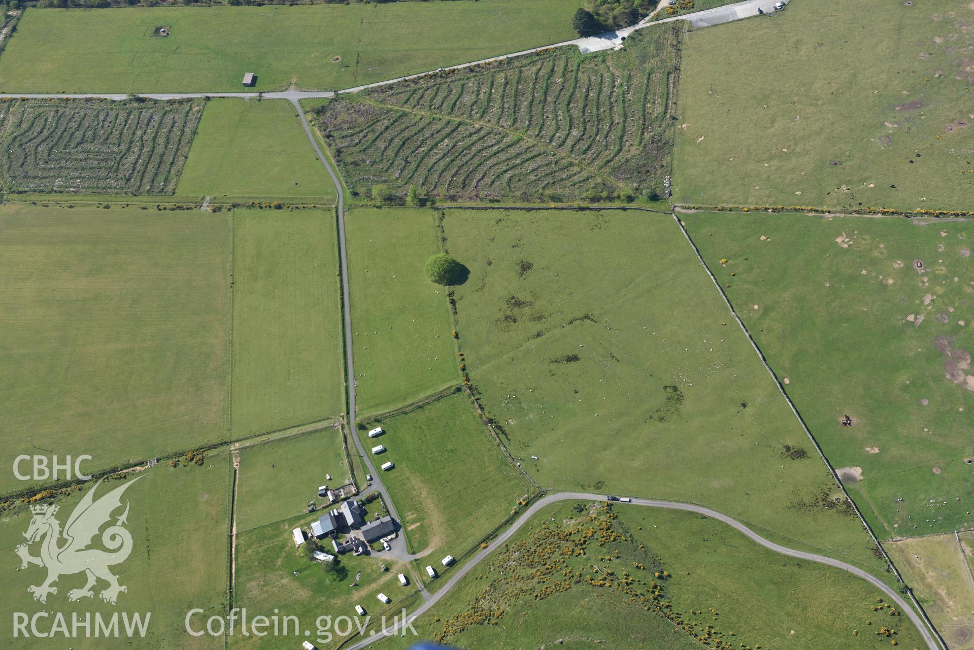 Aerial photography of the Tanforhesgan enclosure taken on 3rd May 2017.  Baseline aerial reconnaissance survey for the CHERISH Project. ? Crown: CHERISH PROJECT 2017. Produced with EU funds through the Ireland Wales Co-operation Programme 2014-2020. All material made freely available through the Open Government Licence.