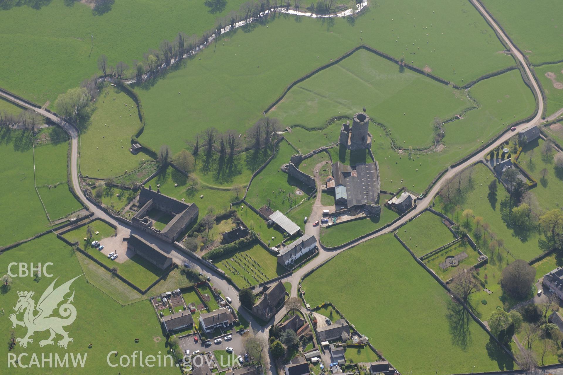 Tretower Village, Castle, Court, Cottage, Barn and Leat, Ty Llys Farm and St John's Church. Oblique aerial photograph taken during the Royal Commission's programme of archaeological aerial reconnaissance by Toby Driver on 21st April 2015