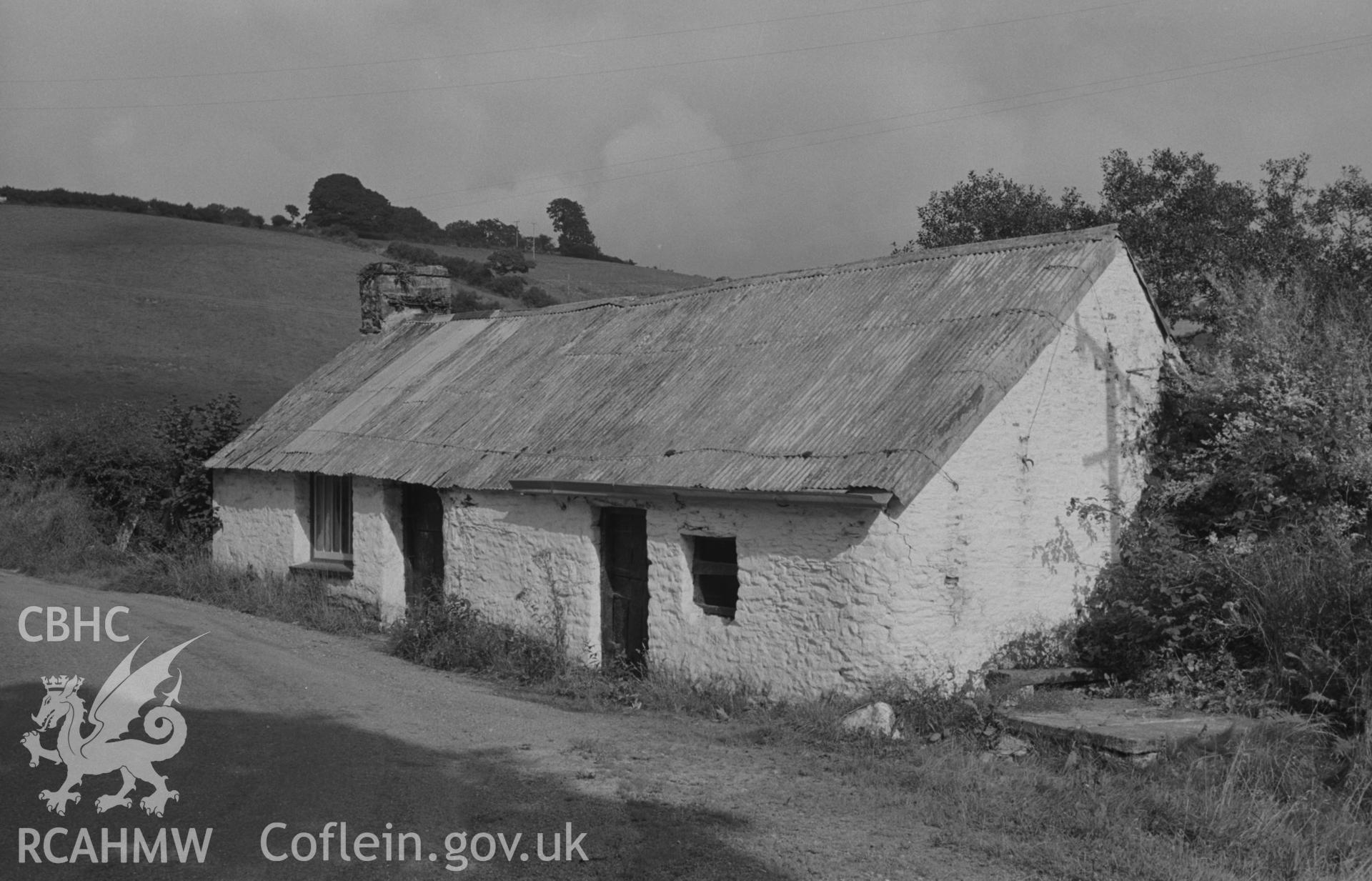 Digital copy of a black and white negative showing Melin Cwm-Hyar cottages on the Cerdin, 2.5km south east of Ffostrasol. Photographed by Arthur O. Chater on 19th August 1967, looking east from Grid Reference SN 391 459.