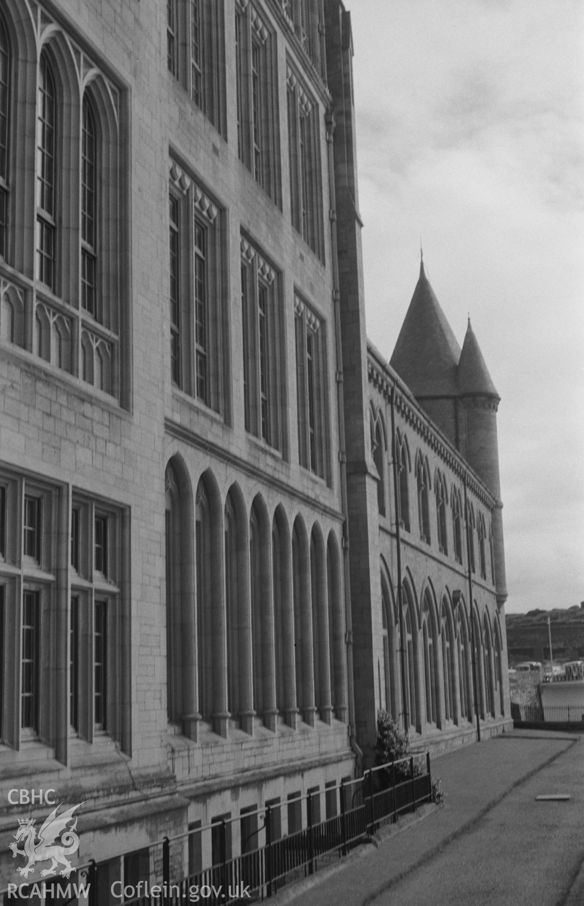 Digital copy of a black and white negative showing detail of the north west facing side of the Old College, on Aberystwyth promenade. Photographed by Arthur O. Chater on 15th August 1967 from Grid Reference SN 581 817.