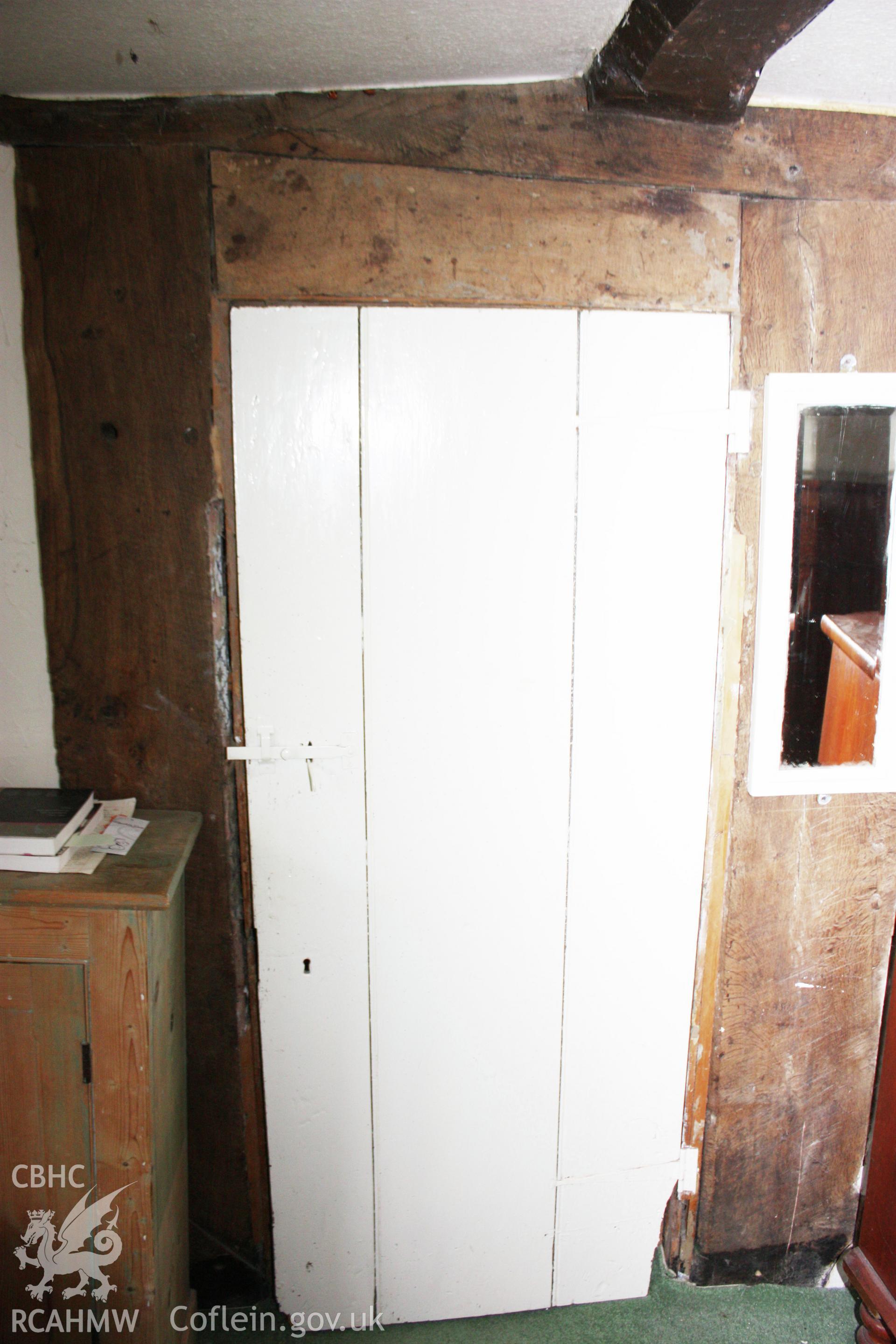 Interior wooden door at Glanhafon-Fawr Farmhouse. Photographic survey of Glanhafon-Fawr Farmhouse conducted by Geoff Ward on 4th November 2010.