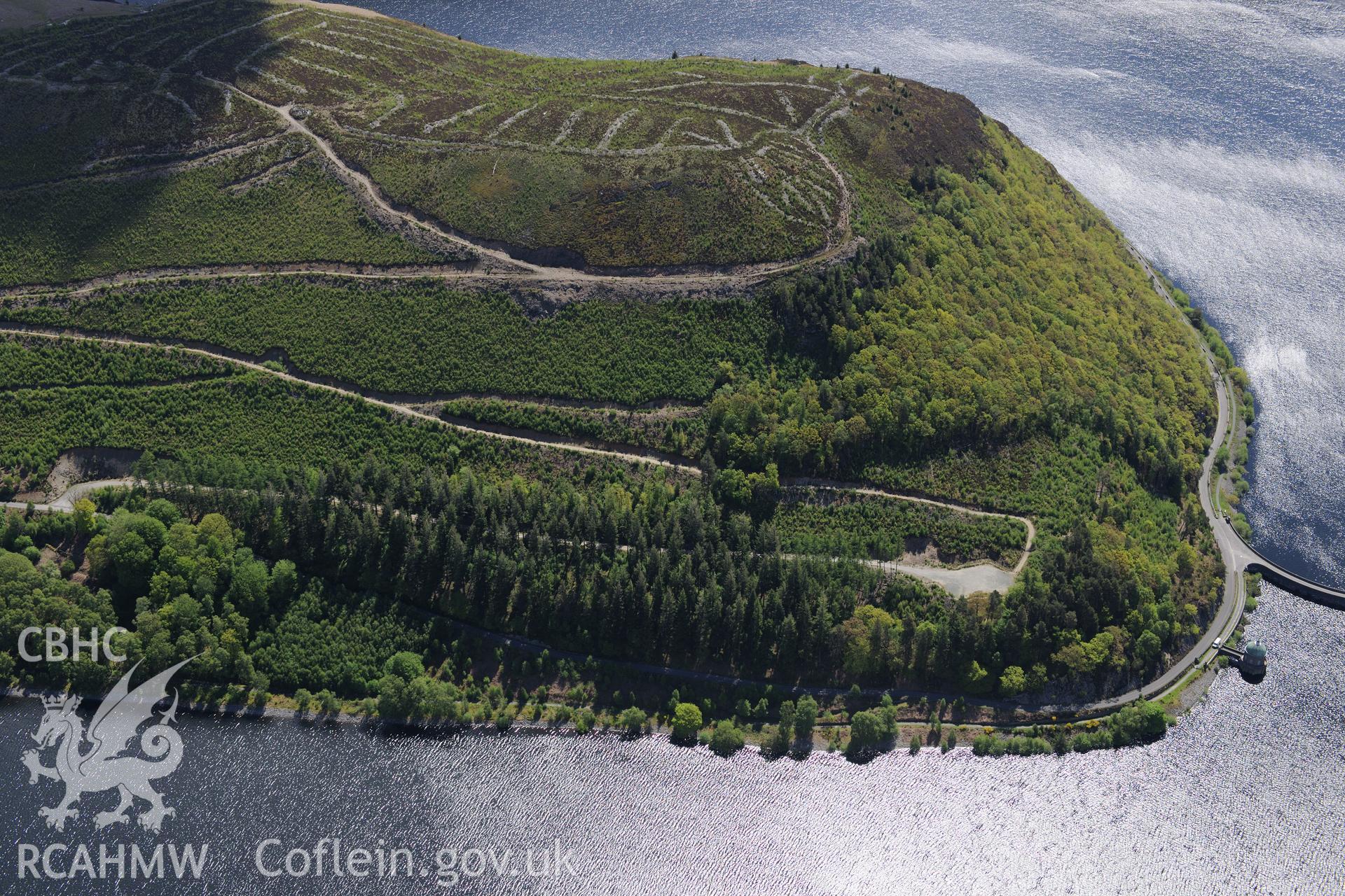 Garreg-Ddu dam, valve and reservoir and Coed-y-Foel pill boxes at the Elan Valley water scheme. Oblique aerial photograph taken during the Royal Commission's programme of archaeological aerial reconnaissance by Toby Driver on 3rd June 2015.