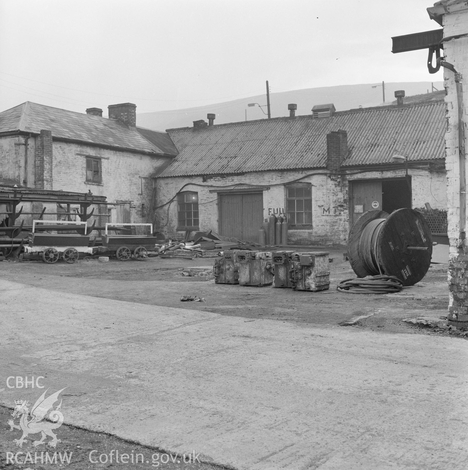 Digital copy of an acetate negative showing exterior of blacksmith's shop at Big Pit, from the John Cornwell Collection.