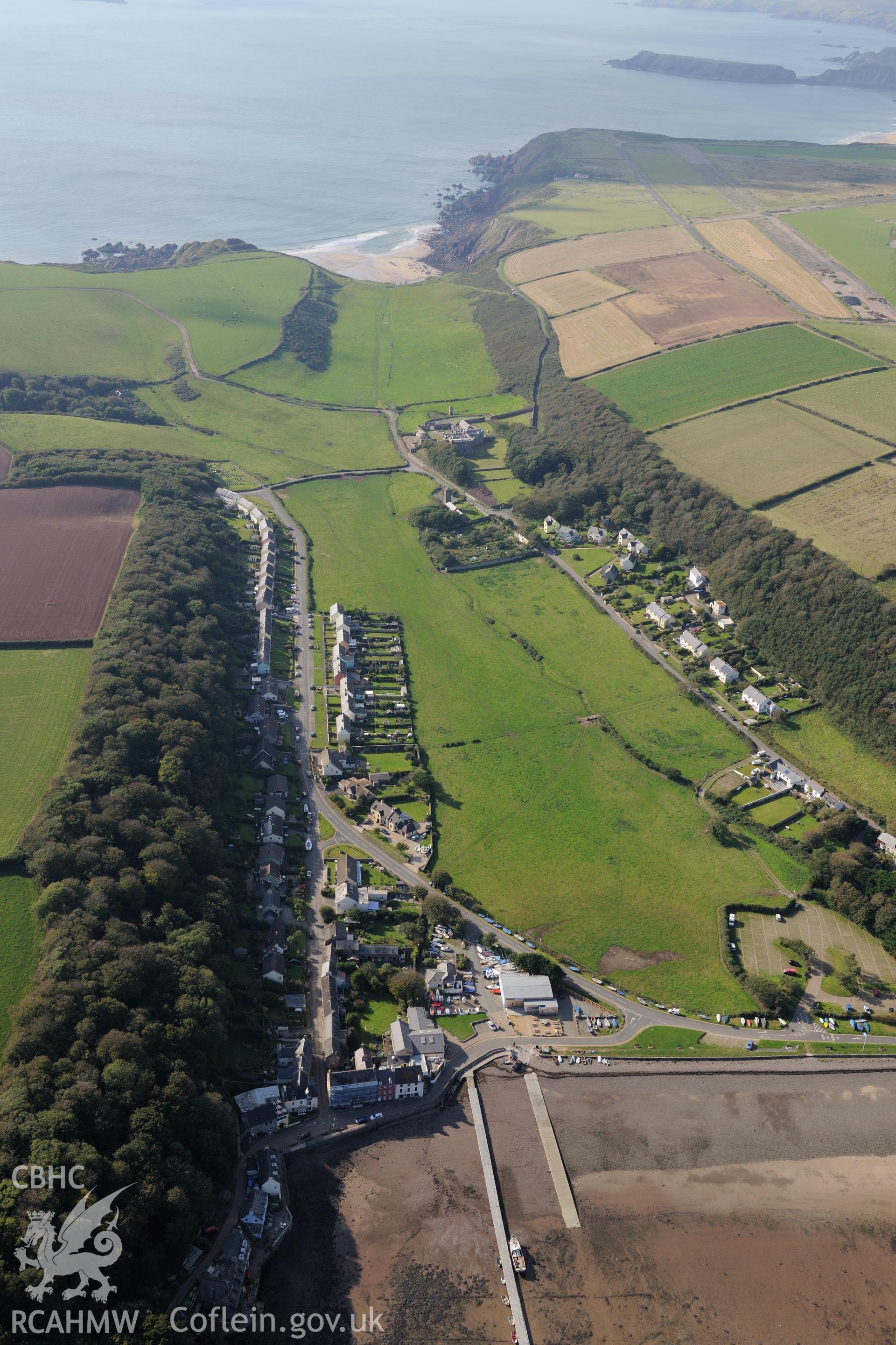 The village of Dale and its landing place on the Pembrokeshire coast, west of Milford Haven. Oblique aerial photograph taken during Royal Commission's programme of archaeological aerial reconnaissance by Toby Driver on 30th September 2015.