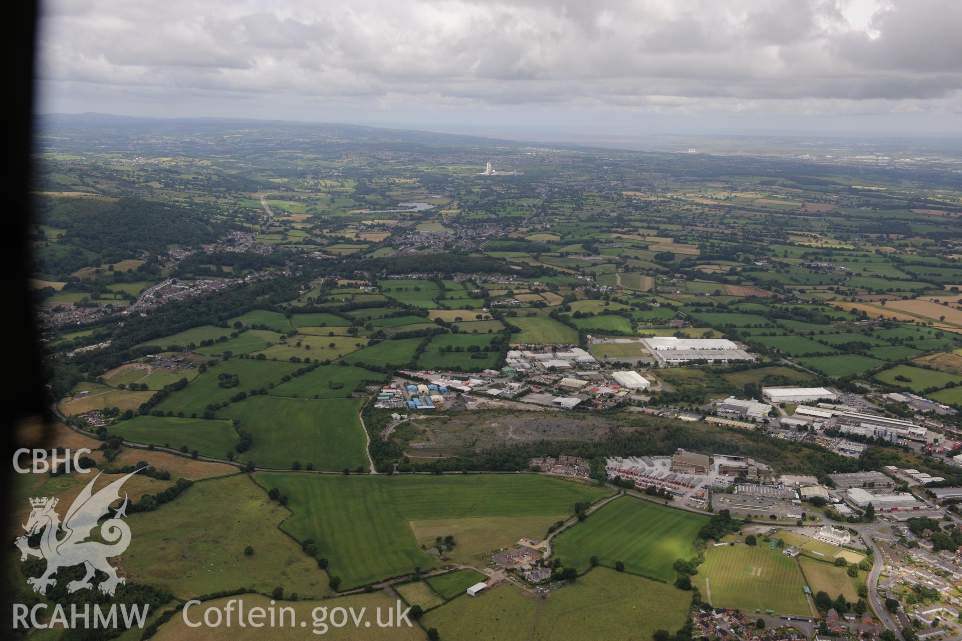 The village of Llay, near Wrexham, including view of Miner's Institute and Pavilion. Oblique aerial photograph taken during the Royal Commission's programme of archaeological aerial reconnaissance by Toby Driver on 30th July 2015.