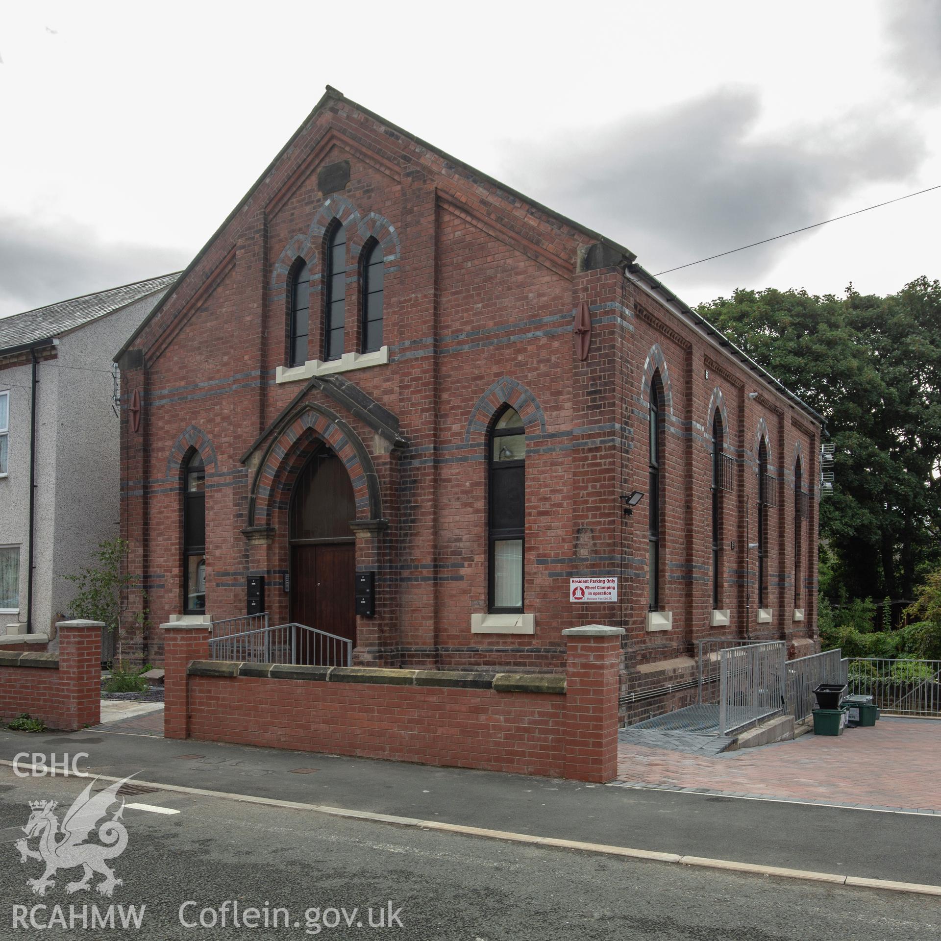 Colour photograph showing front elevation, side elevation and entrance of Talbot Road Methodist chapel, Wrexham. Photographed by Richard Barrett on 15th September 2018.