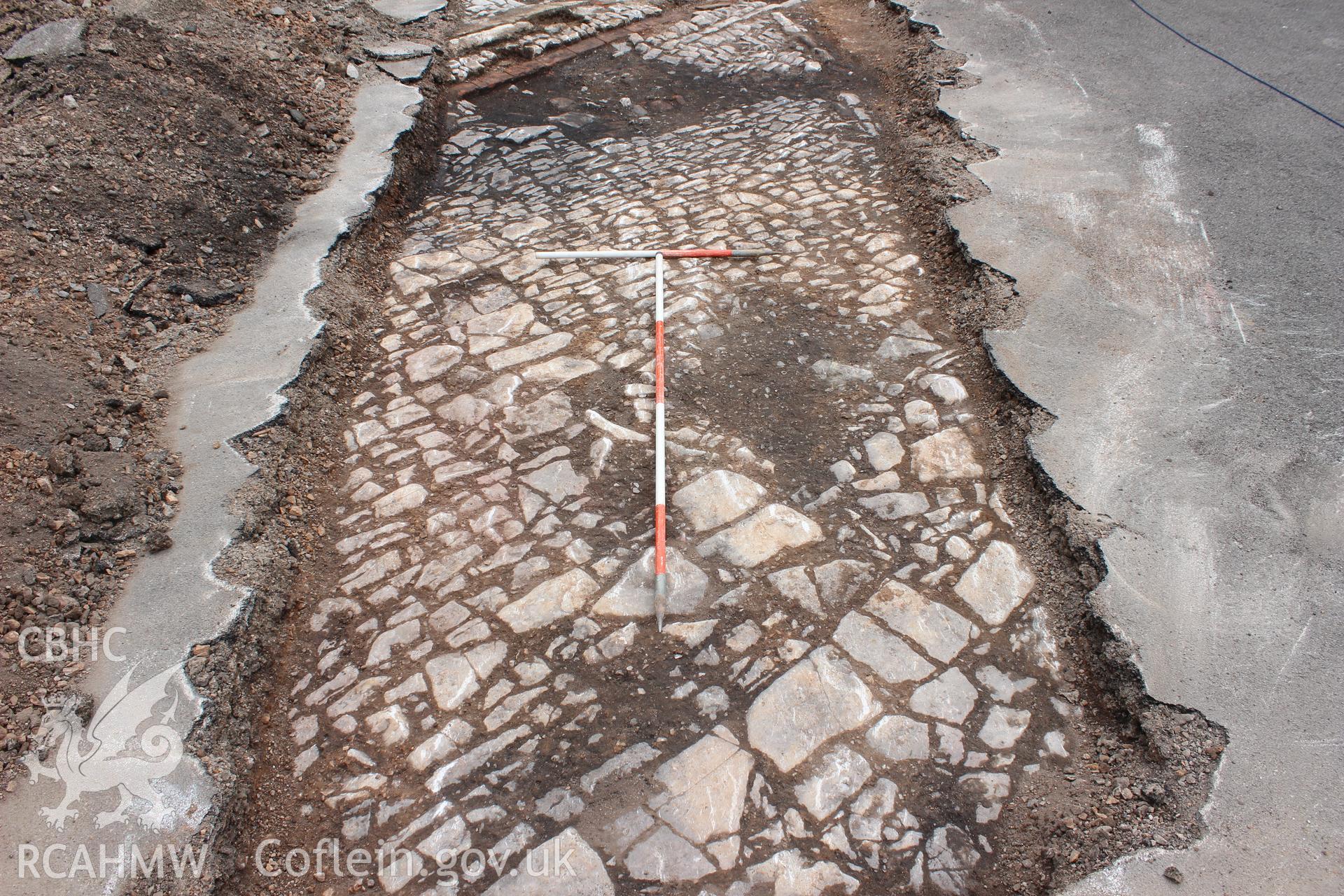 Plan shot of cobbled surfaces and structure. Photographed as part of an Archaeological Evaluation of The Bridge Inn, Chepstow, carried out by Archaeology Wales, 2015.