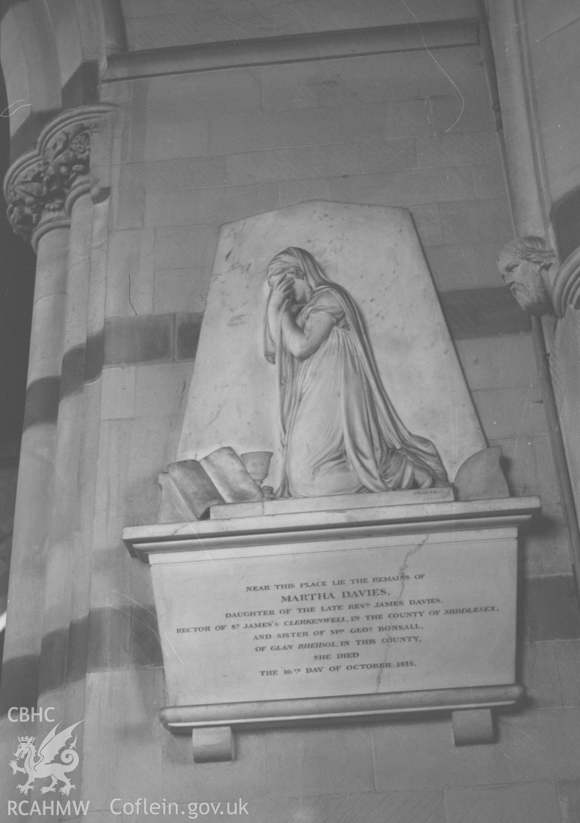 Digital copy of a black and white negative showing 1813 memorial to Martha Davies by chantrey at rear of north aisle of St. Michael's church, Aberystwyth. Photographed by Arthur O. Chater in August 1967.