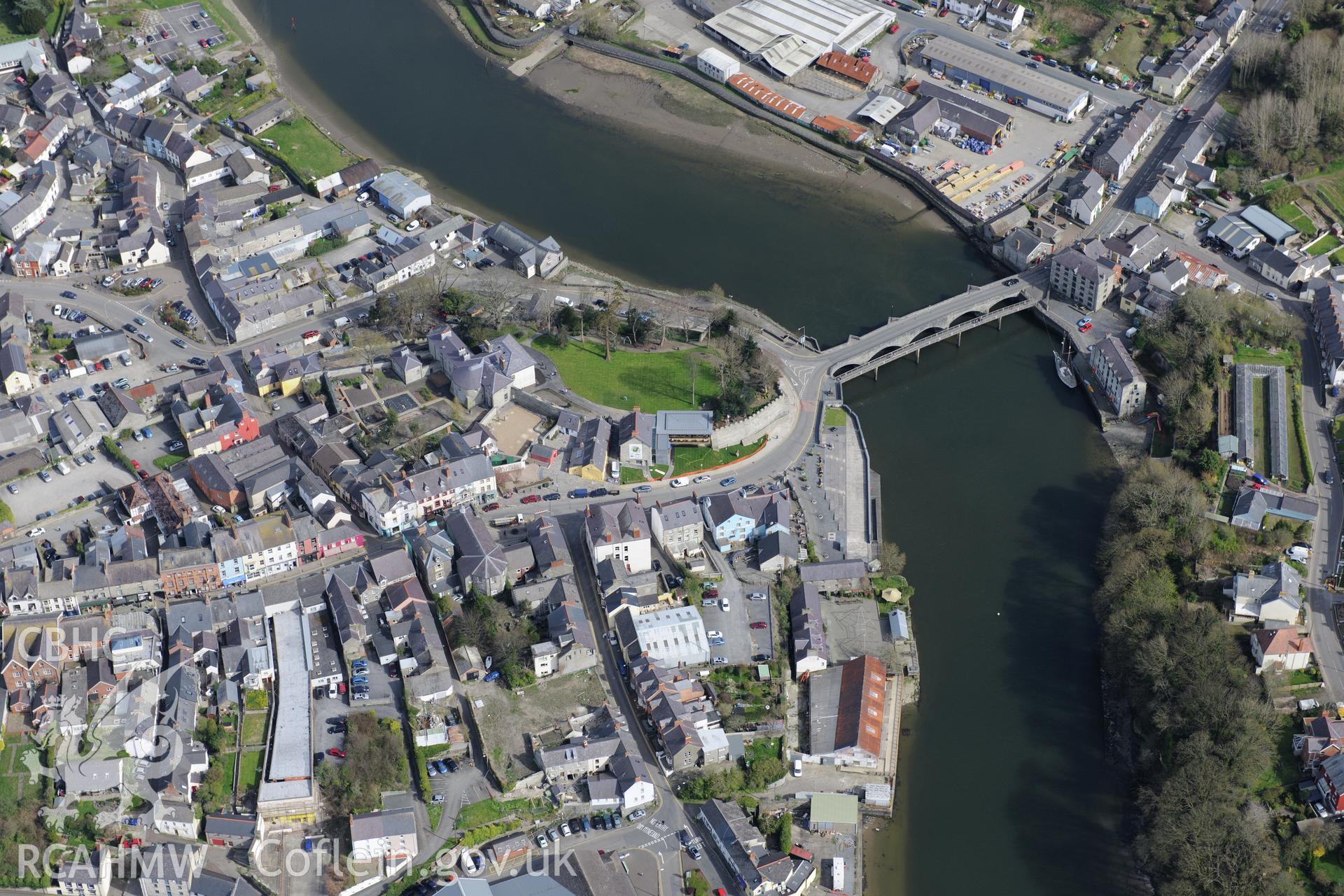 Cardigan Town, Castle, Castle House, Harbour and Bridge. Oblique aerial photograph taken during the Royal Commission's programme of archaeological aerial reconnaissance by Toby Driver 15th April 2015.