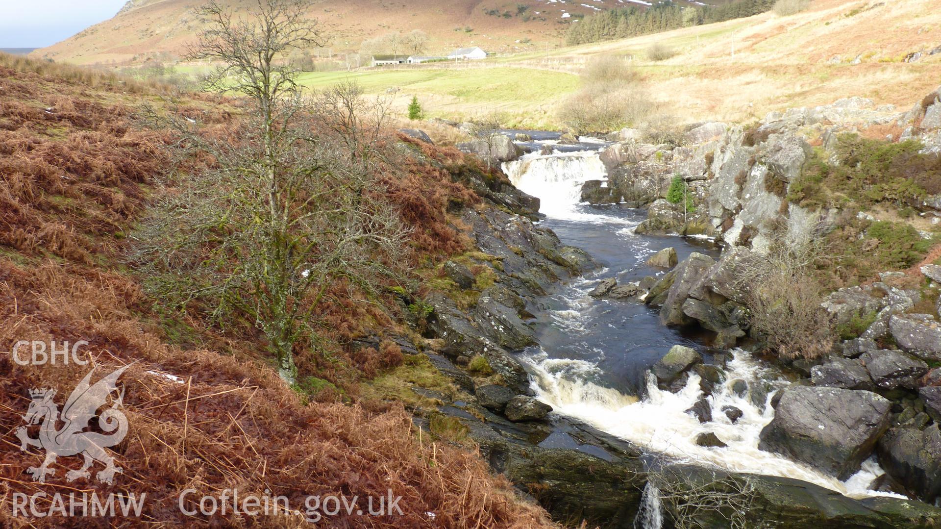View along stretch of Afon Claerwen & location of weir, just above waterfall at turn of the river. Photographed for Archaeological Desk Based Assessment of Afon Claerwen, Elan Valley, Rhayader. Assessment by Archaeology Wales, 2017-18. Project no. 2573.