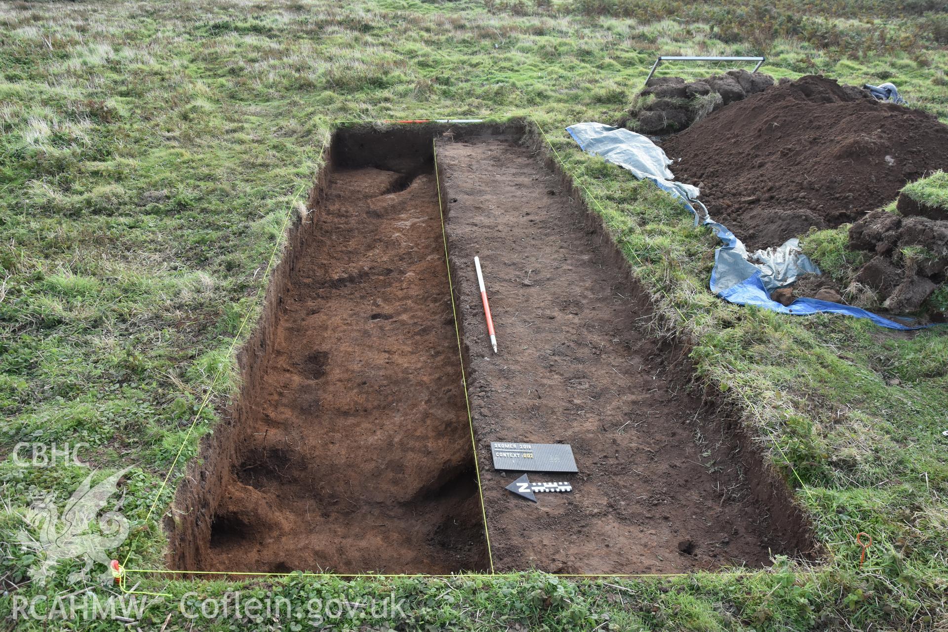 Investigator's photography showing the evaluation excavation of a geophysical anomaly in Well Meadow, Skomer Island, between 25-27th Sept 2018 as part of the Skomer Island Project. General view of trench from west with lower subsoil showing old warrens.