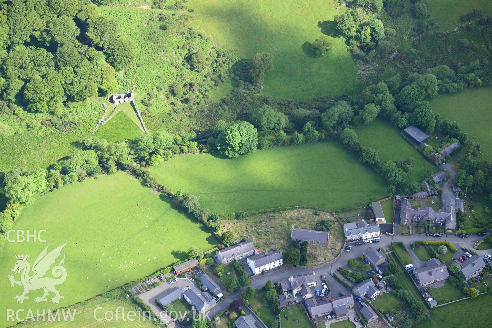 Ffynnon Gybi holy well and church, and Charles Jones' Almshouses, Llangybi, near Llanystumdwy. Oblique aerial photograph taken during the Royal Commission's programme of archaeological aerial reconnaissance by Toby Driver on 23rd June 2015.