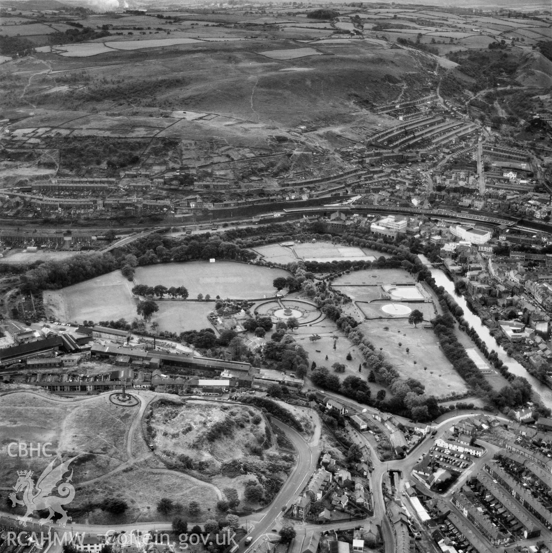 Digital copy of a black and white oblique aerial photograph showing Ynysangharad Park, Pontypridd, taken by Aerofilms Ltd and dated September 1959.