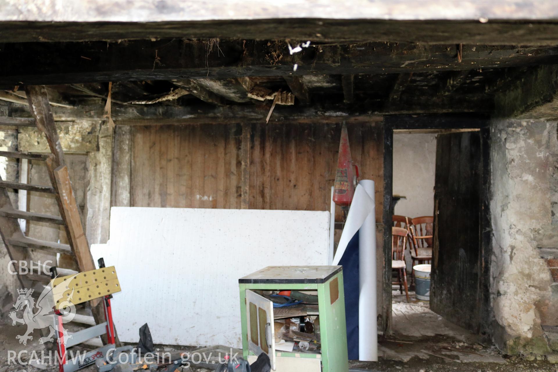 Photograph showing interior view of barn and cottage ground floor at Maes yr Hendre, taken by Dr Marian Gwyn, 6th July 2016. (Original Reference no. 0095)