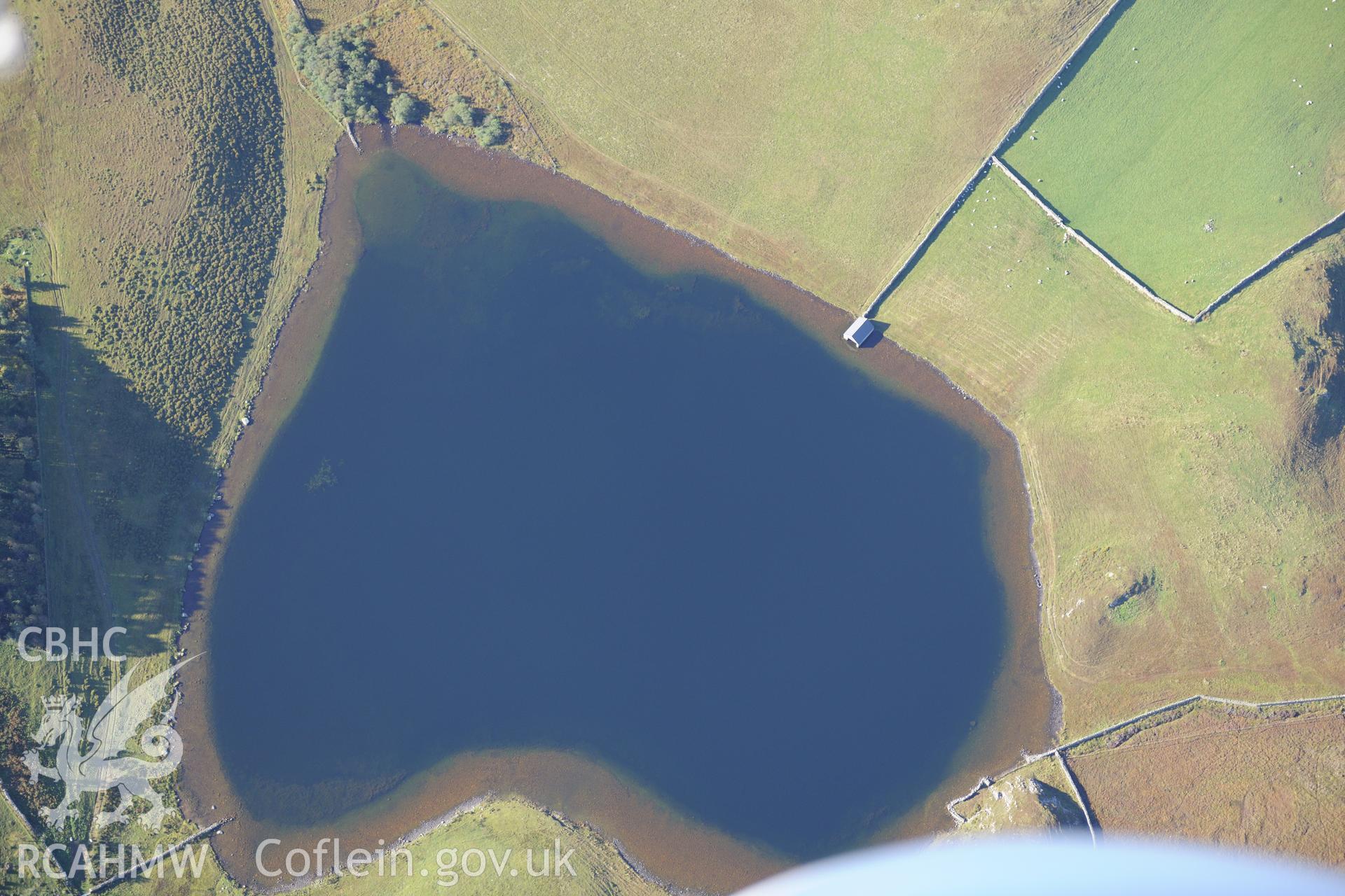 Boathouse on the smaller Llyn Cregennen on the slopes of Cadair Idris. Oblique aerial photograph taken during the Royal Commission's programme of archaeological aerial reconnaissance by Toby Driver on 2nd October 2015.