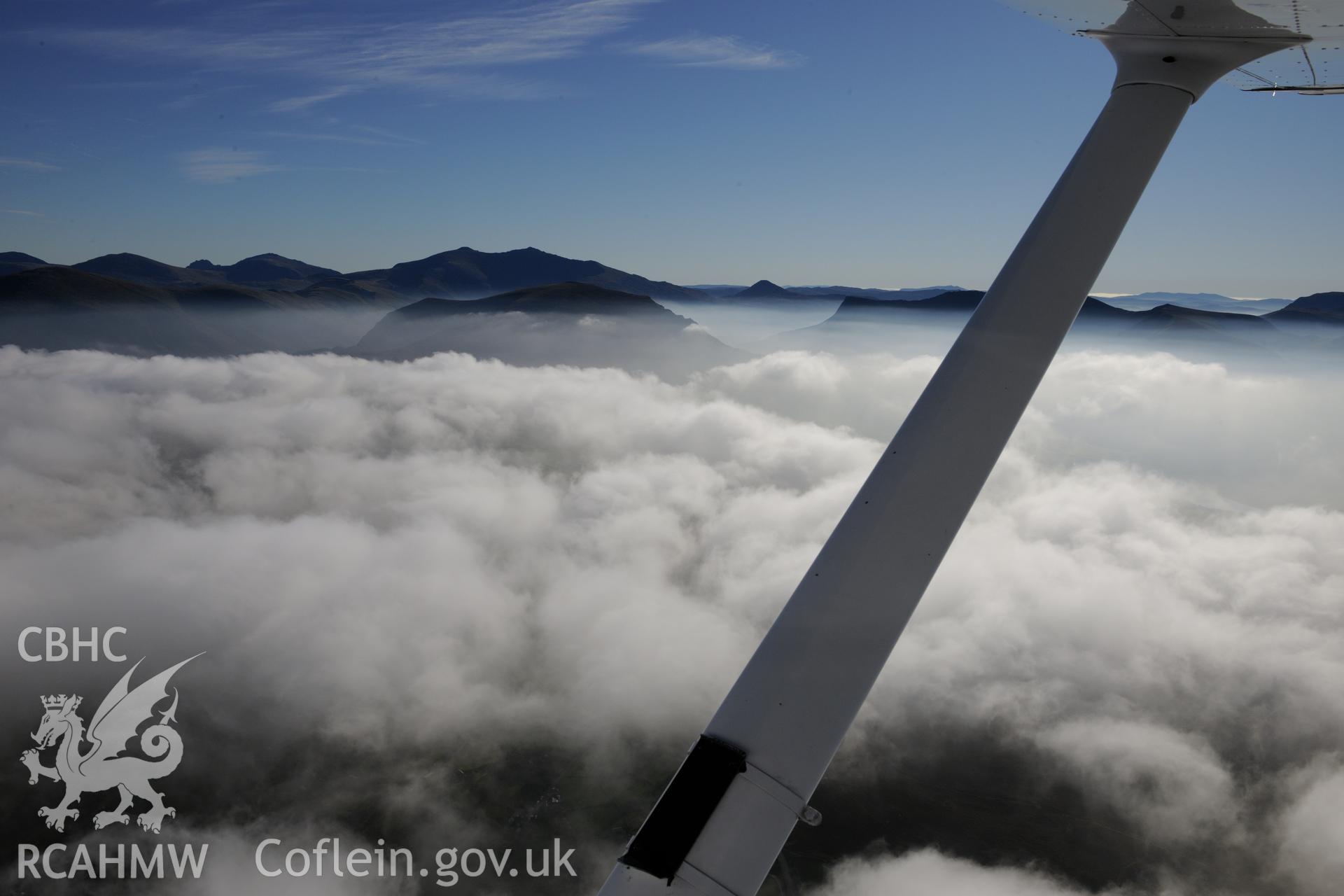 View from the north west of Snowdon, Snowdonia. Oblique aerial photograph taken during the Royal Commission's programme of archaeological aerial reconnaissance by Toby Driver on 2nd October 2015.