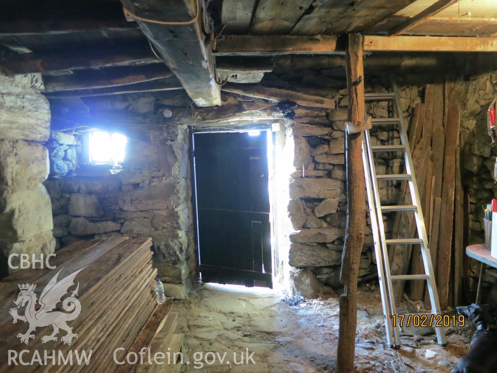 Interior west elevation of barn at Pencerrig Pellaf, Ffordd Uchaf, Harlech. Photographed by Kimberley Urch as part of photographic survey for planning application (ref. no. NP5/61/LB446A Snowdonia National Park Authority).