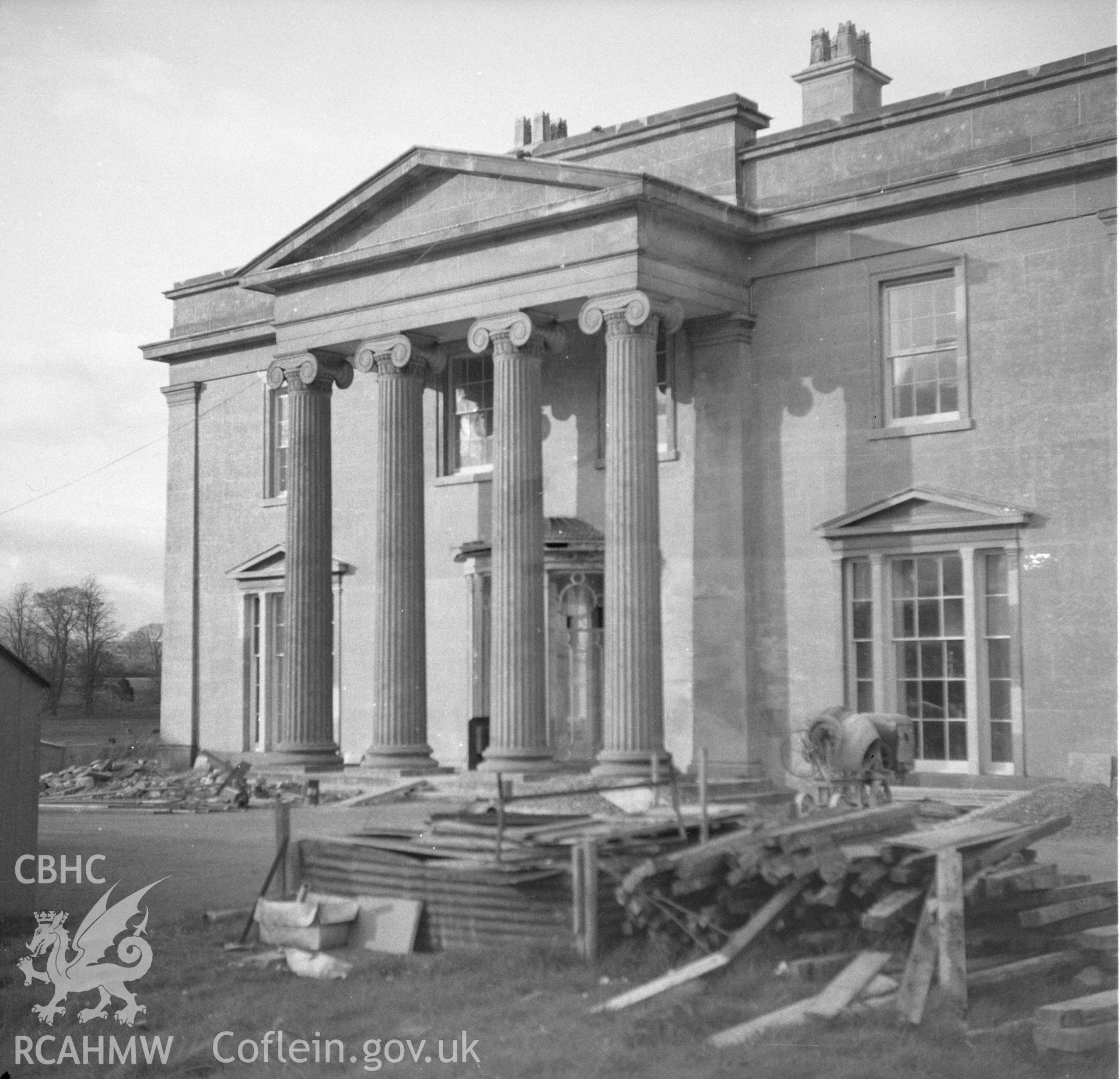 Digital copy of a nitrate negative showing view of building work at an unnamed house in or near Abergavenny.
