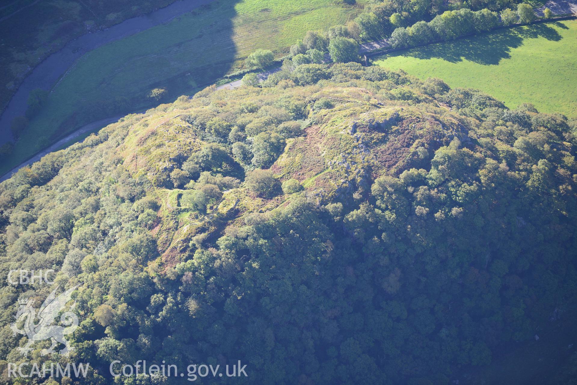 Dinas Emrys hillfort near Beddgelert. Oblique aerial photograph taken during the Royal Commission's programme of archaeological aerial reconnaissance by Toby Driver on 2nd October 2015.
