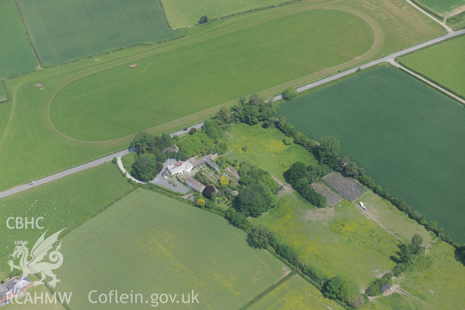 Broadheath House and Garden, Prestigne. Oblique aerial photograph taken during the Royal Commission's programme of archaeological aerial reconnaissance by Toby Driver on 11th June 2015.