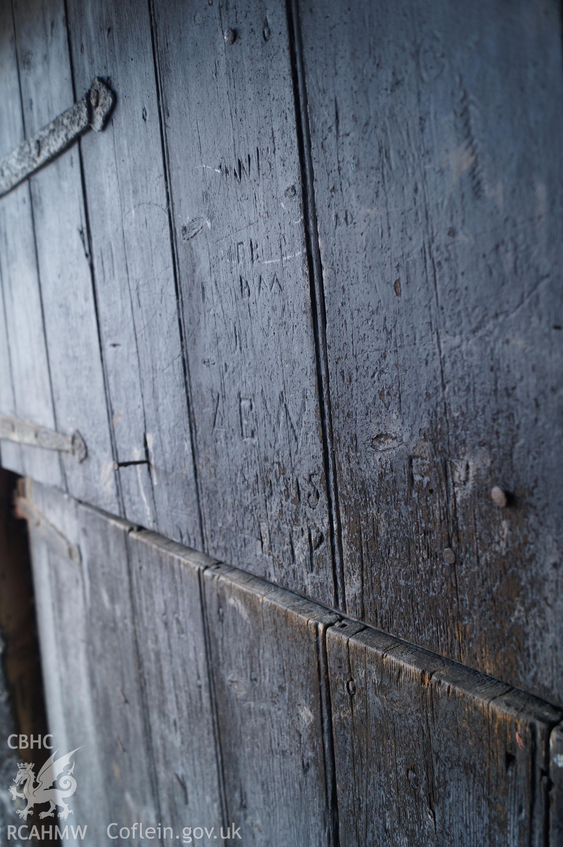 View of 'graffiti on stable door' at Gwrlodau Farm, Llanbedr, Crickhowell. Photograph and description by Jenny Hall and Paul Sambrook of Trysor, 9th February 2018.