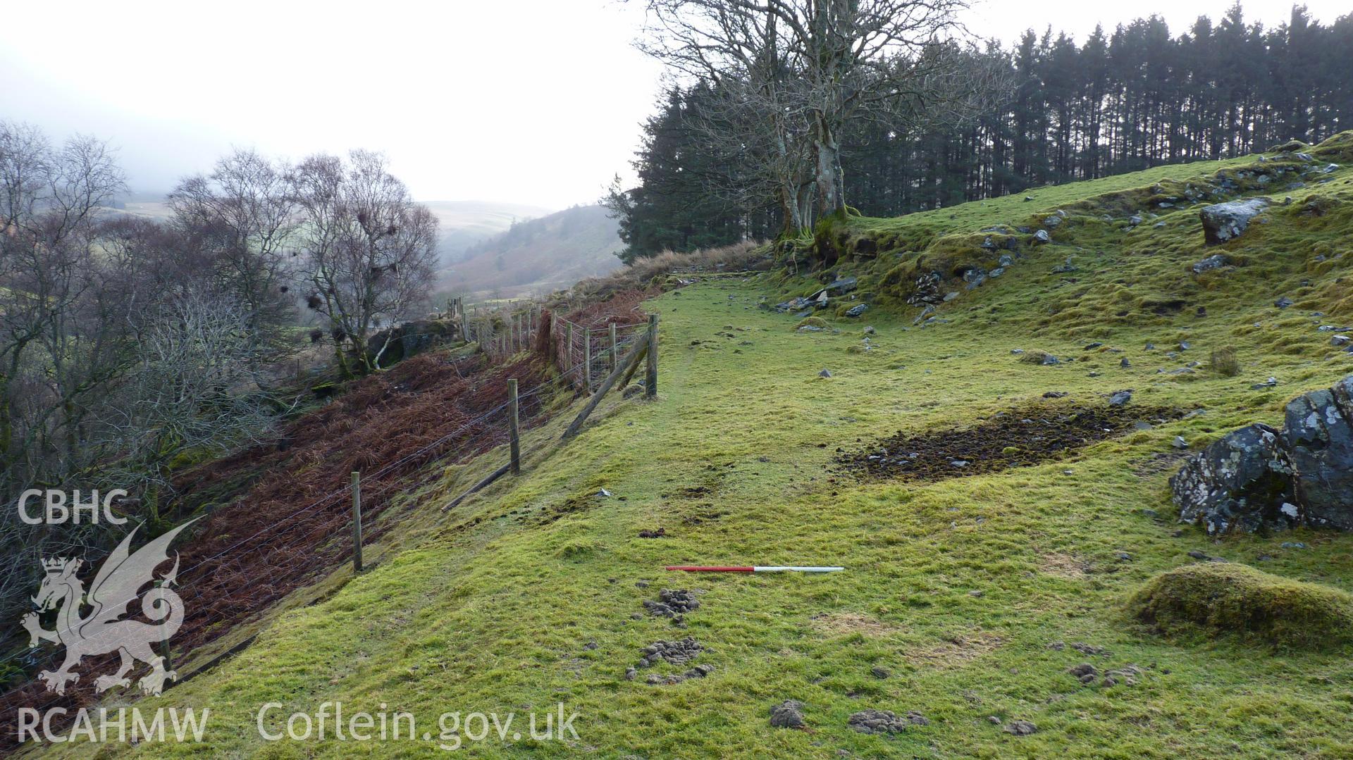 View along trackway with enclosure to the right. Part of metal mining complex. Looking south east. Photographed for Archaeological Desk Based Assessment of Afon Claerwen, Elan Valley, Rhayader. Assessment by Archaeology Wales in 2017-18. Project no. 2573.