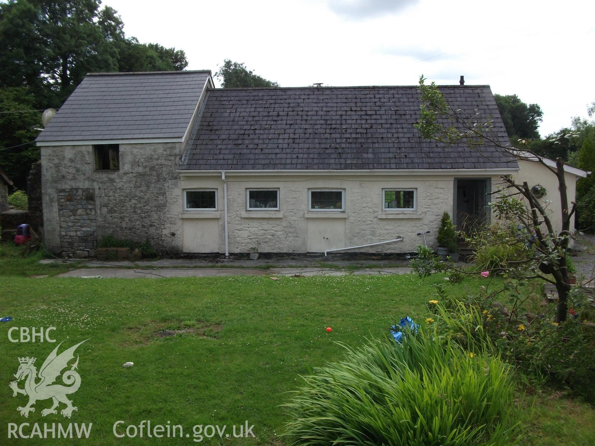 Photograph showing exterior rear elevation of cottage and attached building at Pant-y-Castell, Maesybont, Photographed by Mark Waghorn to meet a condition attached to planning application.