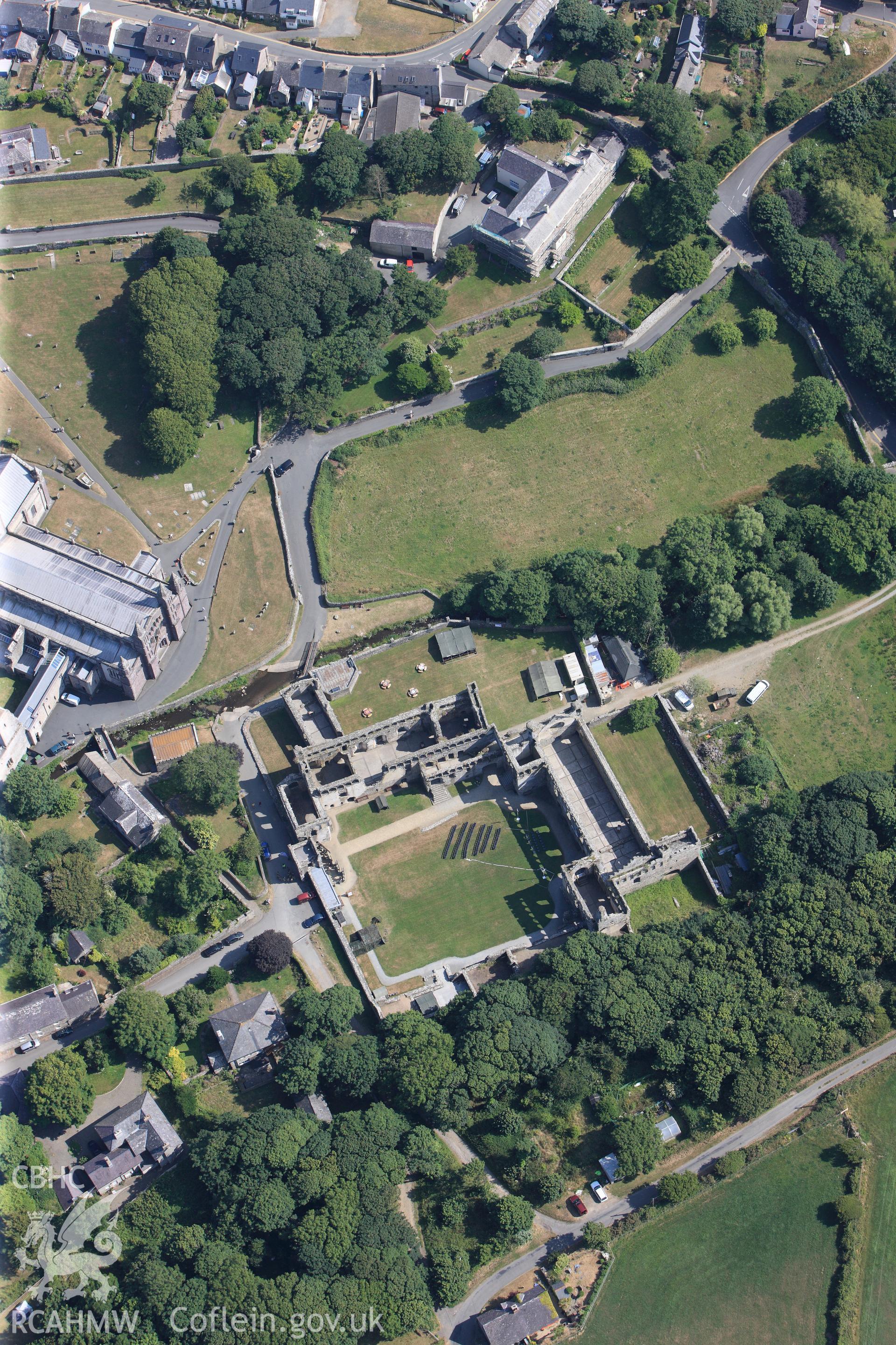 St Davids Cathedral and St Davids Bishops Palace. Oblique aerial photograph taken during the Royal Commission?s programme of archaeological aerial reconnaissance by Toby Driver on 16th July 2013.