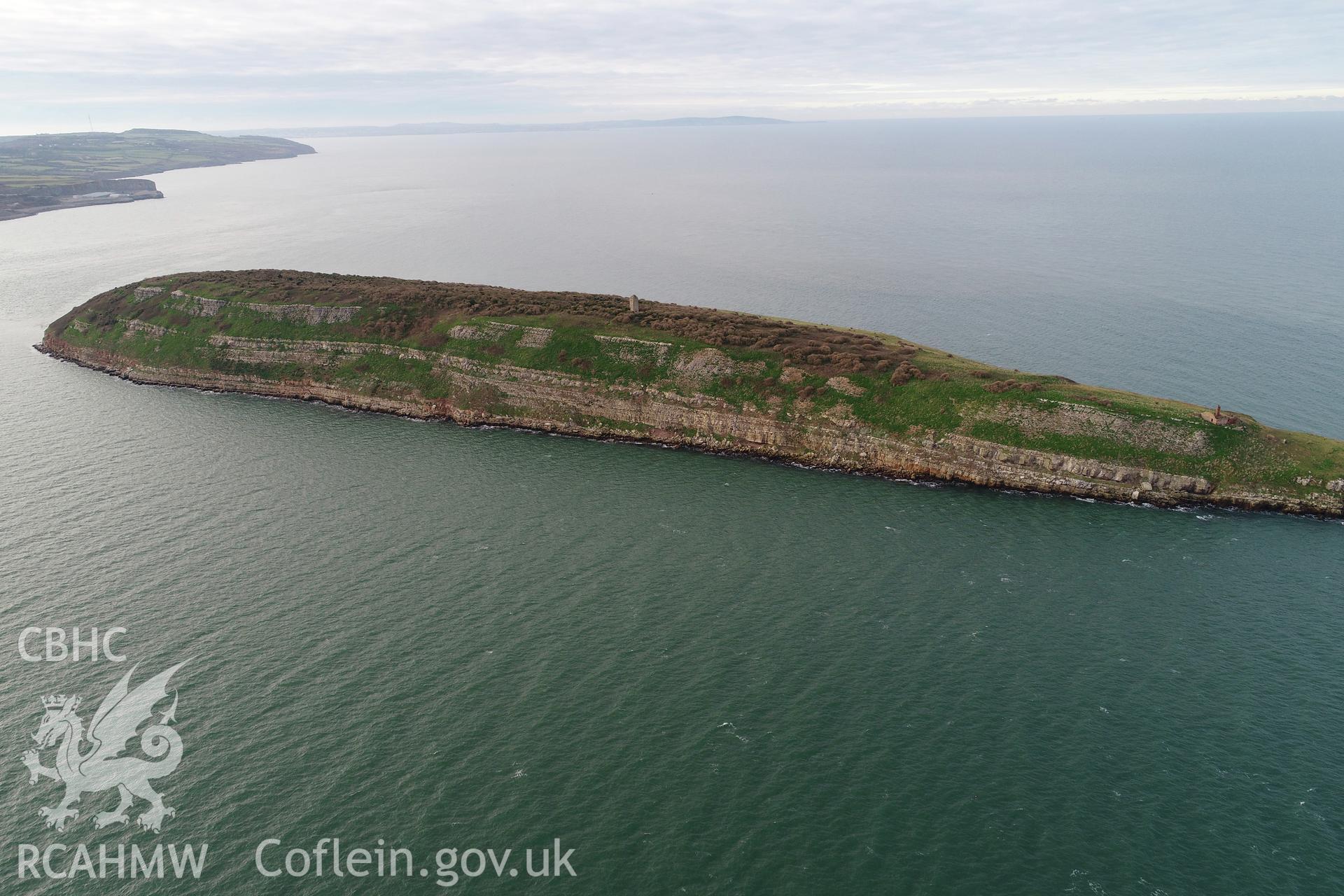 Drone/UAV aerial view of Puffin Island or Ynys Seiriol taken from the south-east on  winter's afternoon on 26th November 2018 for the CHERISH Project. ? Crown: CHERISH PROJECT 2018. Produced with EU funds through the Ireland Wales Co-operation Programme 2014-2020. All material made freely available through the Open Government Licence.