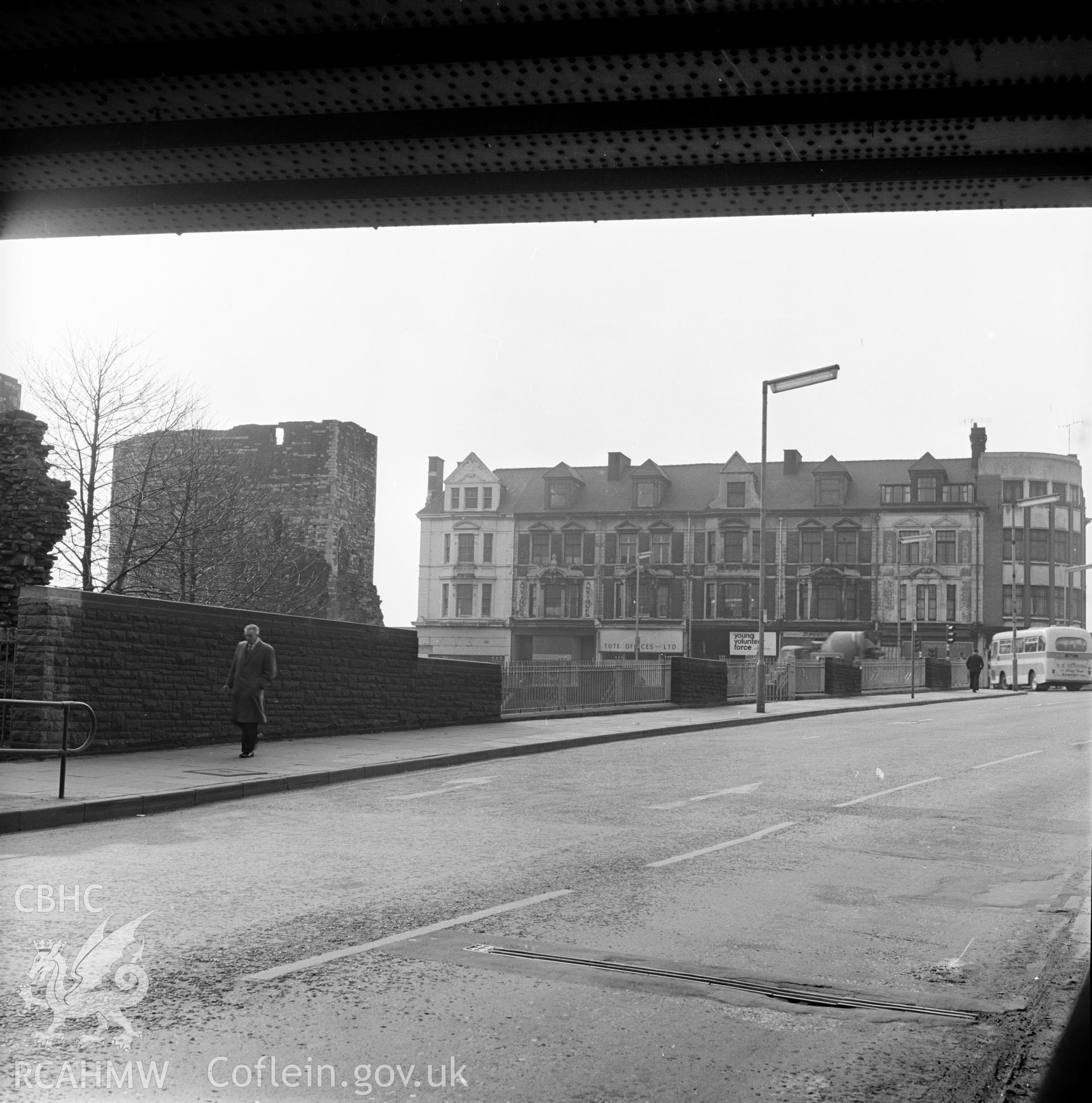 Digital copy of a black and white negative showing Newport Castle, view of south tower from under railway bridge, 27th March 1969.