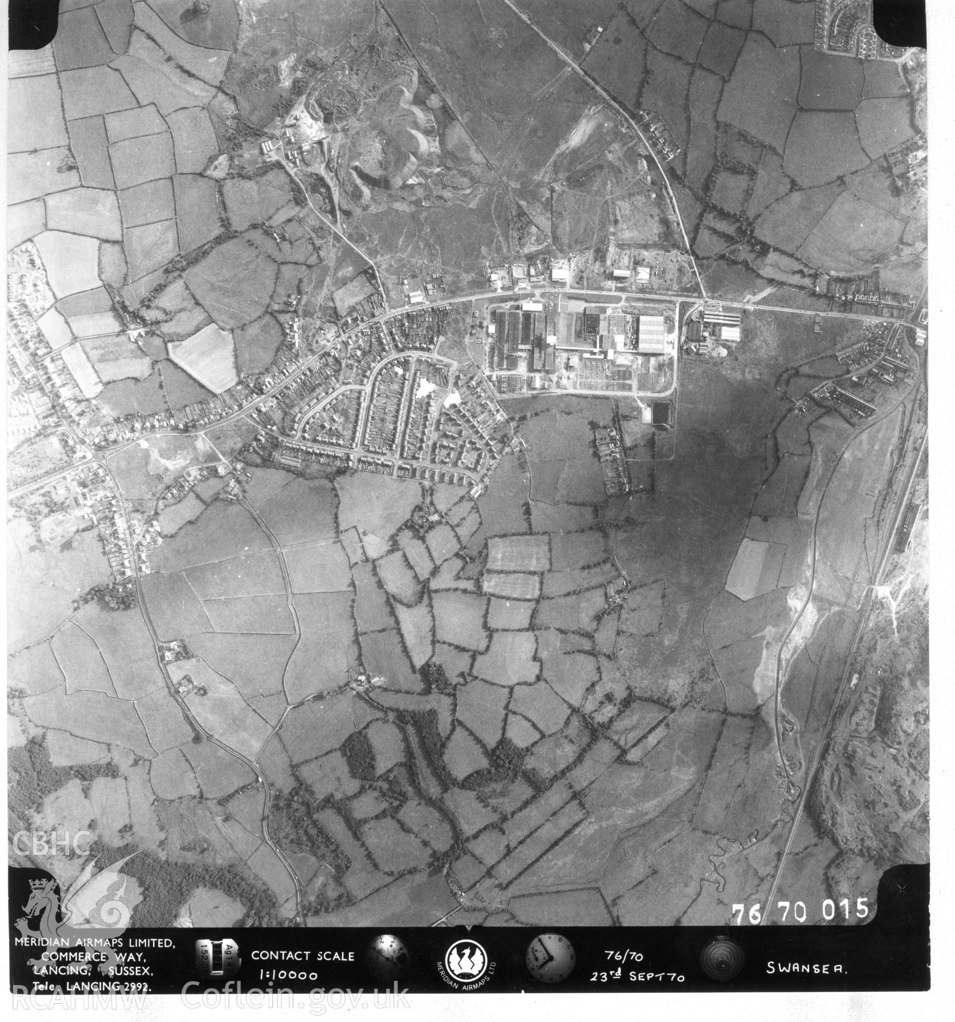 Black and white aerial photograph taken in 23rd September 1970. Part of material used in a Setting Impact Assessment of Land off Phoenix Way, Garngoch Business Village, Swansea, carried out by Archaeology Wales, 2018. Project number P2631.