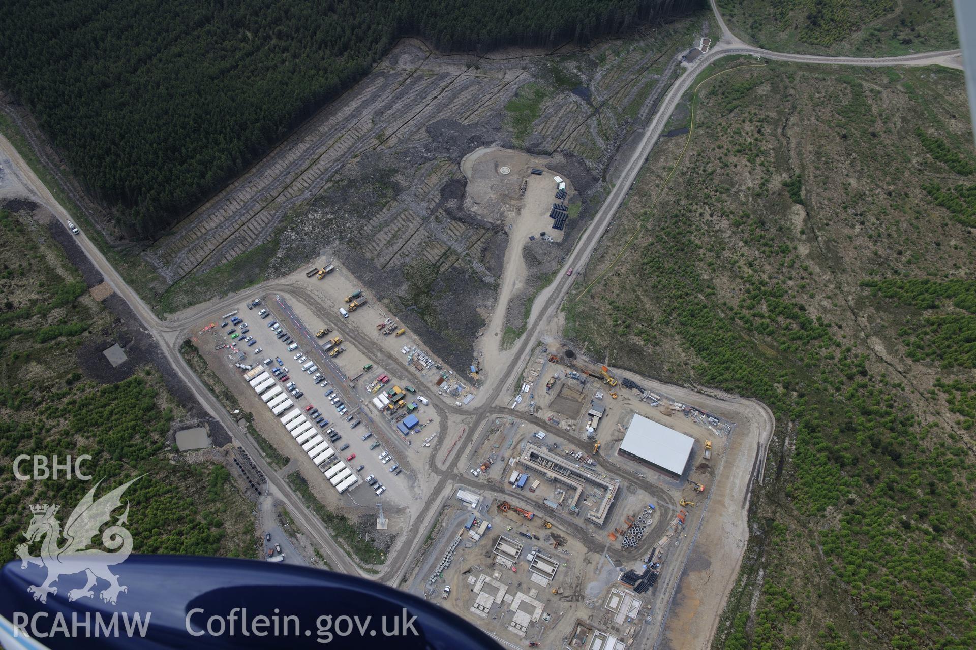 Pen y Cymoedd wind farm under construction before officially opening in September 2017.  Oblique aerial photograph taken during the Royal Commission's programme of archaeological aerial reconnaissance by Toby Driver on 11th June 2015.