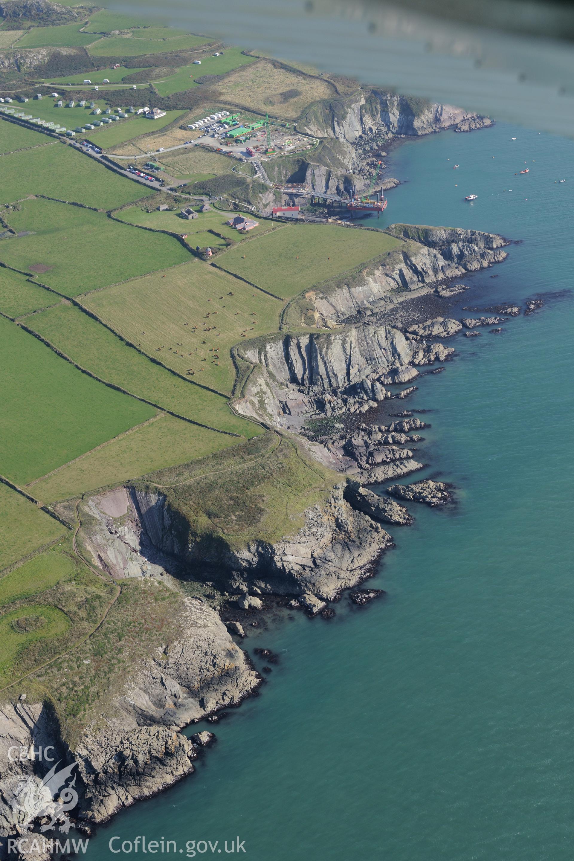 St. Justinian's lifeboat station and St. David's new lifeboat station, Porthstinian, west of St. Davids. Oblique aerial photograph taken during the Royal Commission?s programme of archaeological aerial reconnaissance by Toby Driver on 30th September 2015.
