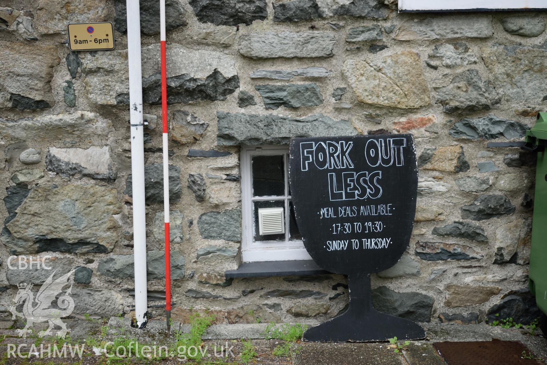 Colour photograph showing view looking north at partly blocked window in the southern elevation of Y Sospan, Llys Owain, Dolgellau. Photographed by I. P. Brookes of Engineering Archaeological Services, June 2019.