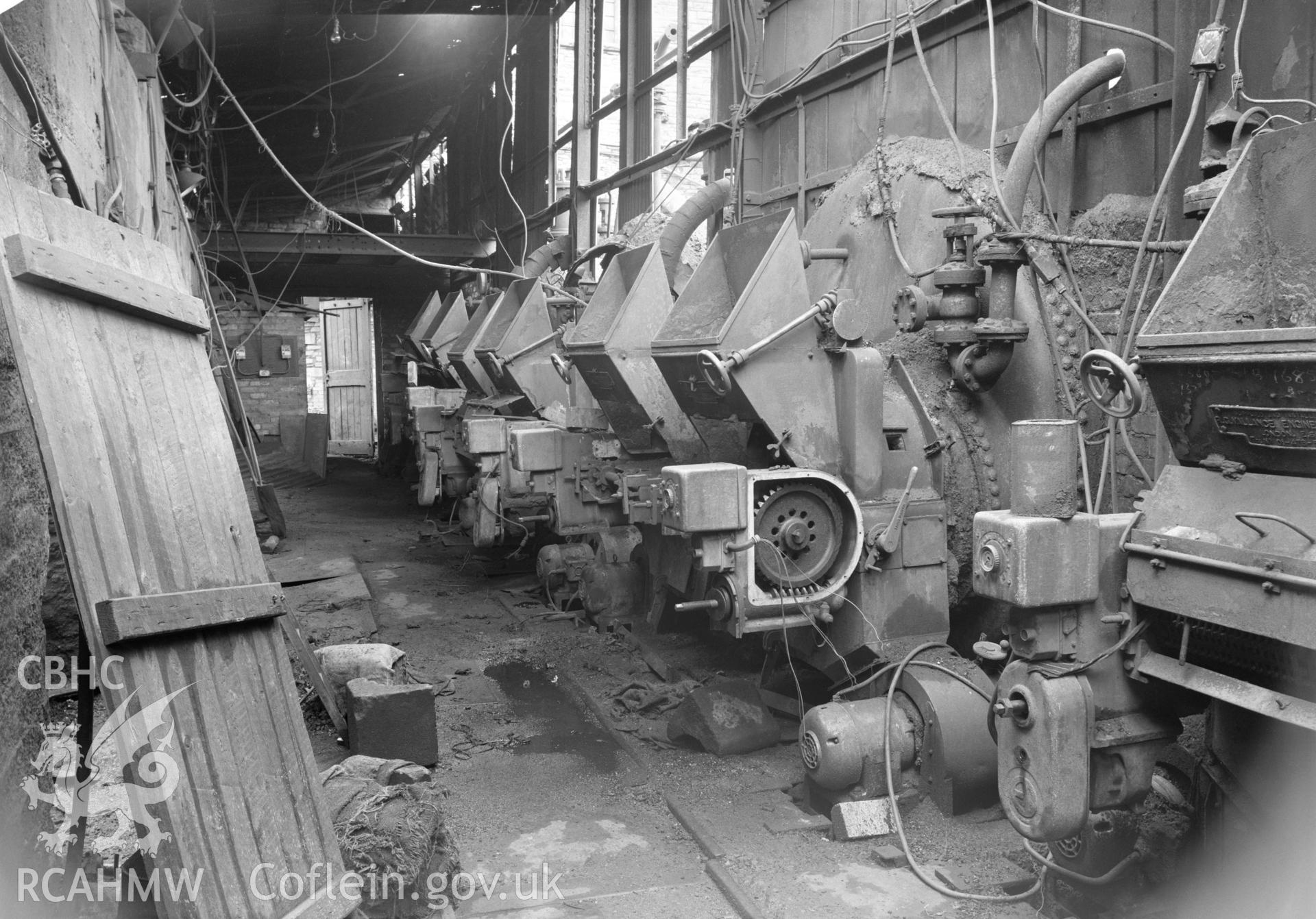 Digital copy of an acetate negative showing mechanical stokers at Celynen South Colliery, from the John Cornwell Collection.