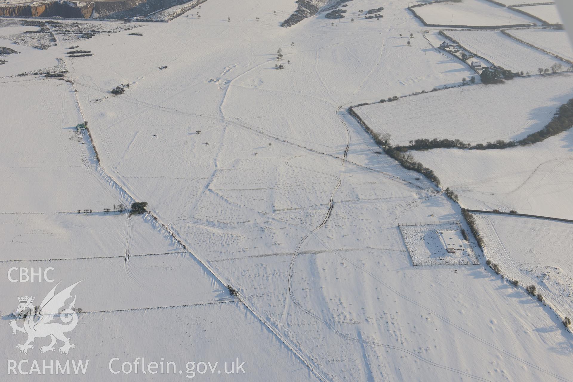 Beacons Down field system, St Brides Major, south west of Bridgend. Oblique aerial photograph taken during the Royal Commission?s programme of archaeological aerial reconnaissance by Toby Driver on 24th January 2013.