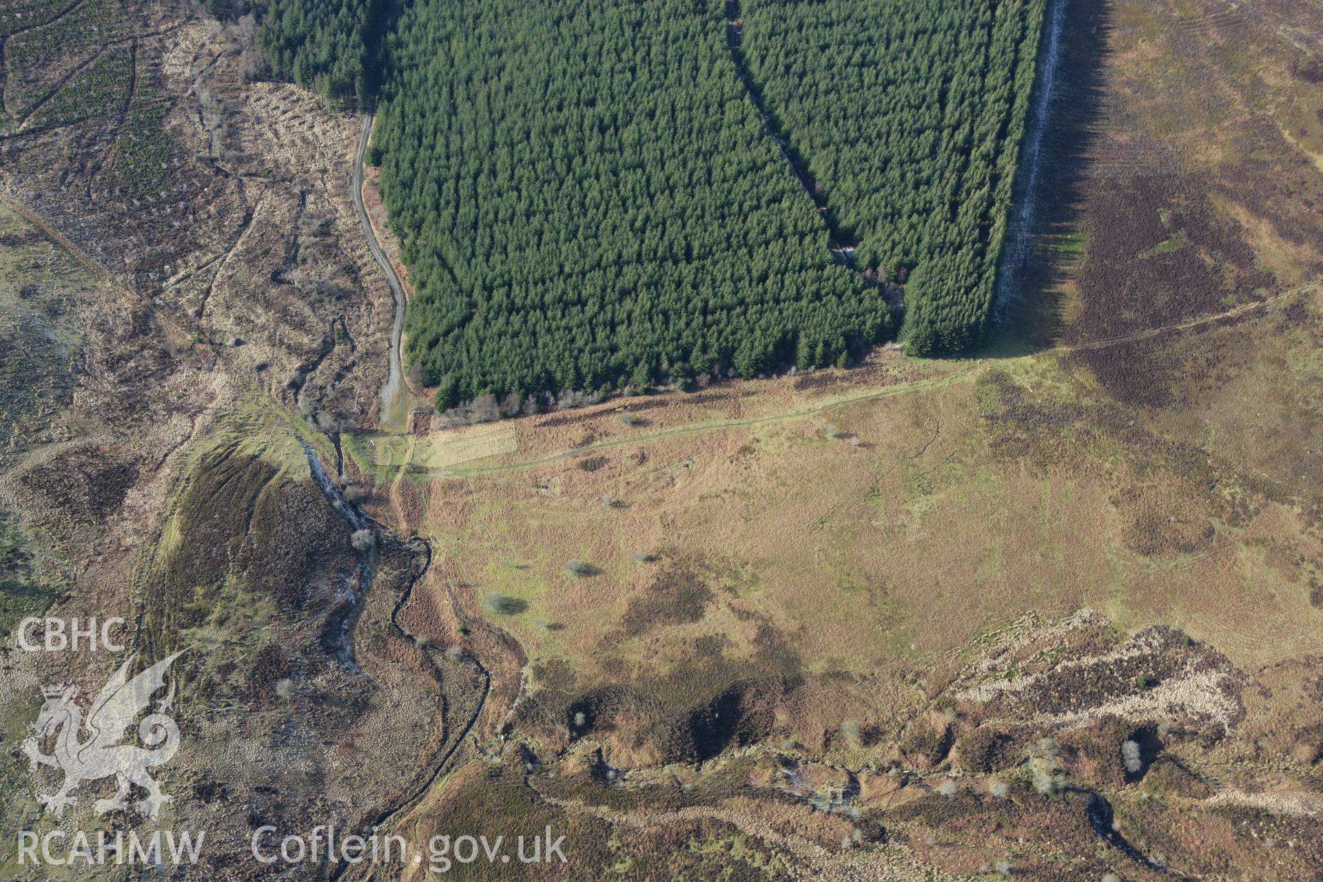 RCAHMW colour oblique photograph of Nant Croes-y-Wernen stone circle. Taken by Toby Driver on 08/02/2011.
