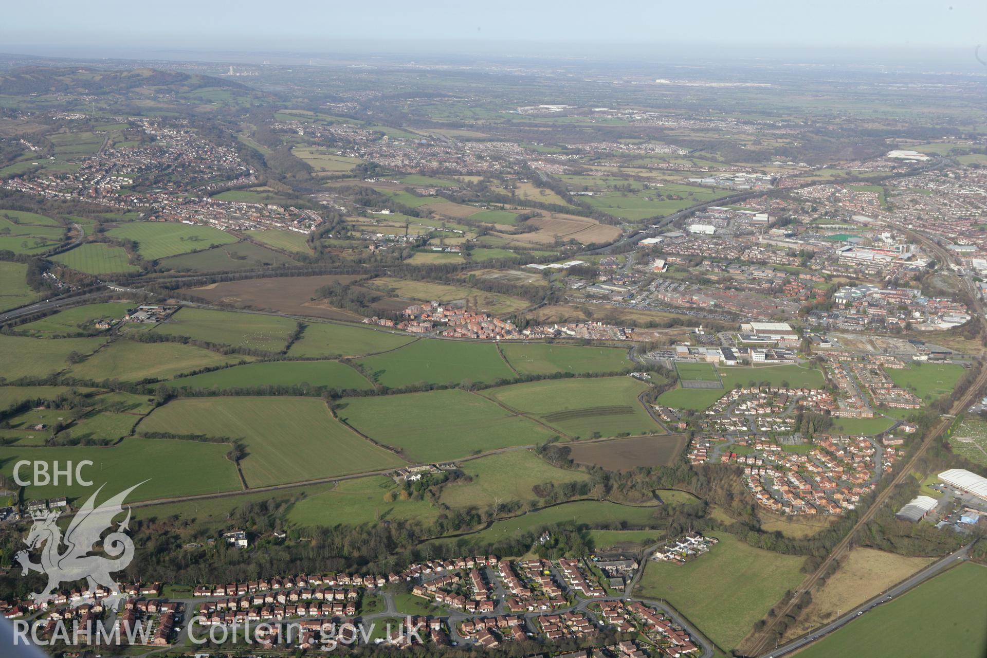 RCAHMW colour oblique photograph of landscape looking north from Rhostyllen towards Wrexham. Taken by Toby Driver on 08/02/2011.