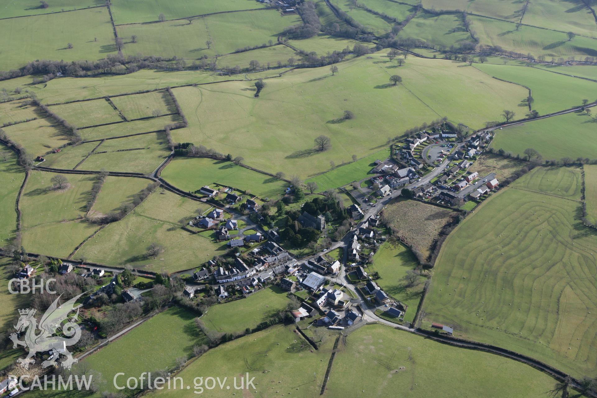 RCAHMW colour oblique photograph of Llansilin village. Taken by Toby Driver on 08/02/2011.